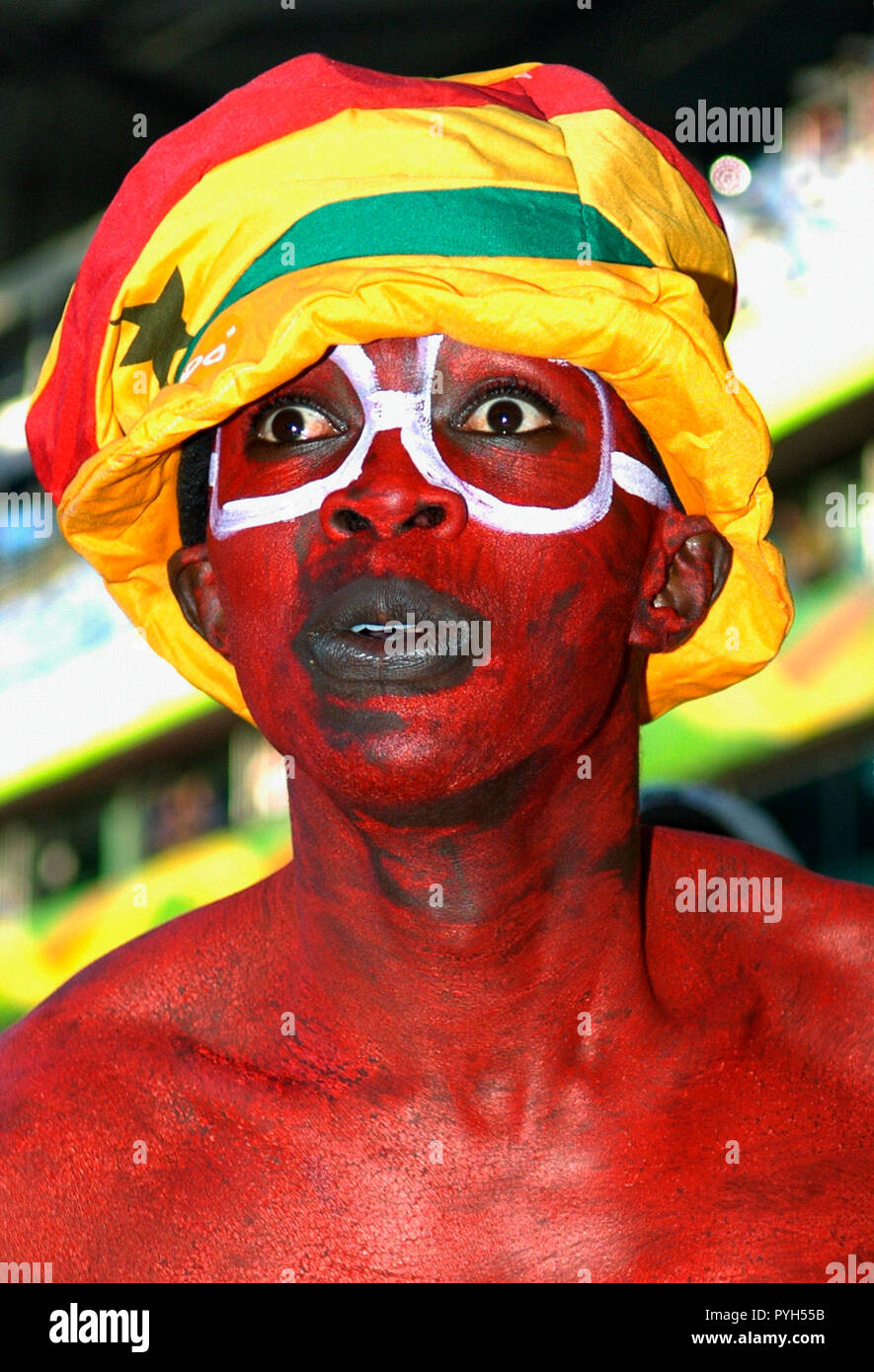 Niedersachsen  Stadion Hannover Germany 12.6.2006,  FIFA World Cup match 9, Italy vs Ghana 2:0 ---- painted fan of Ghana Stock Photo