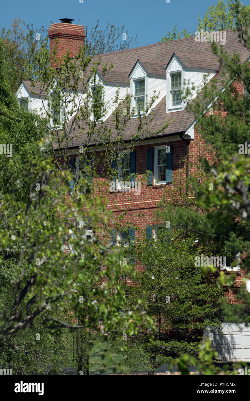 Large house visible through trees in Virginia, USA Stock Photo Alamy