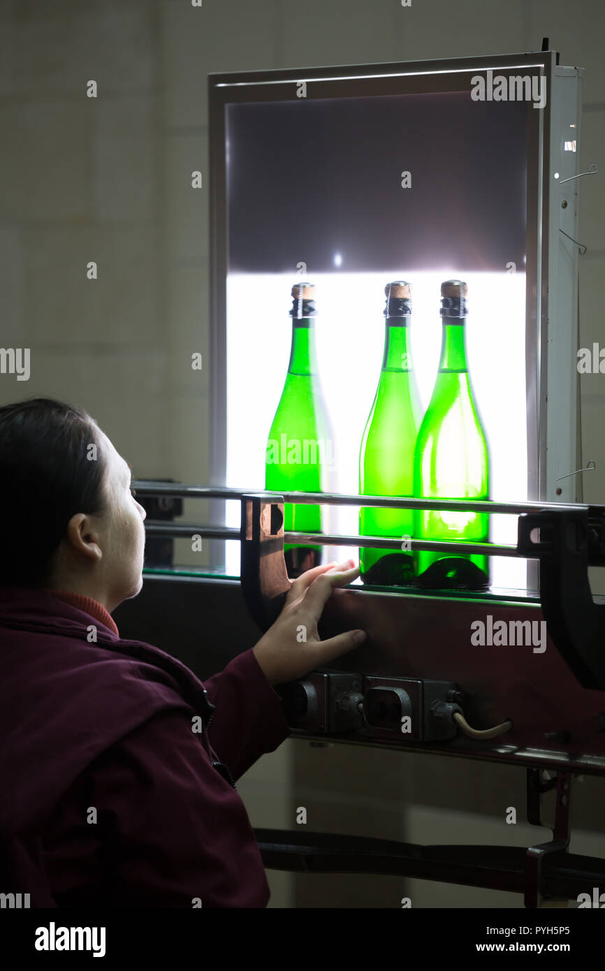 Republic of Moldova, quality control worker at the bottling plant, winery Cricova SA Stock Photo
