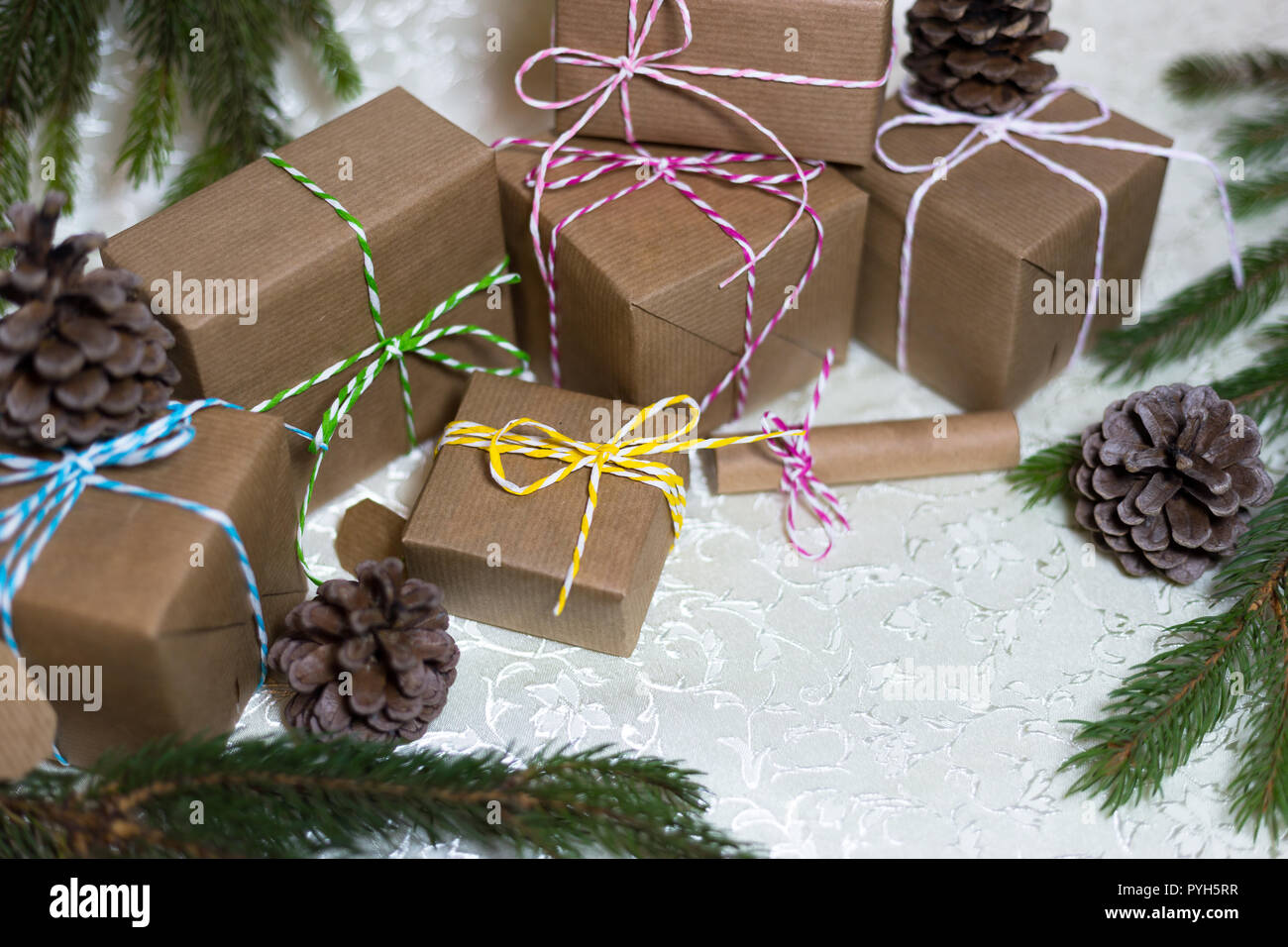 Handmade gift boxes, pine cones and branches, Christmas and New Year ...
