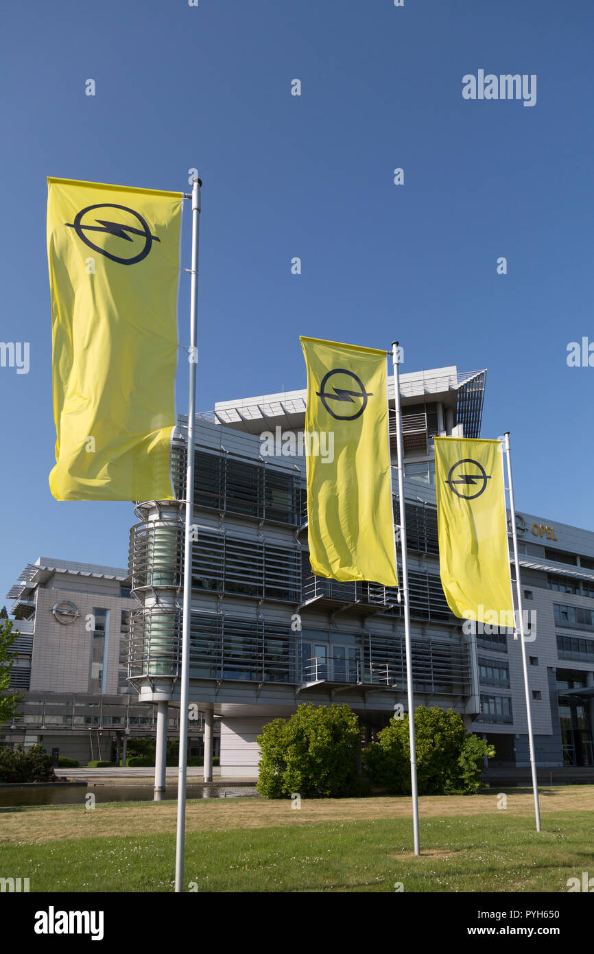 Germany, Ruesselsheim, Opel Automobile GmbH: Flags with Opel logo at group headquarters Stock Photo