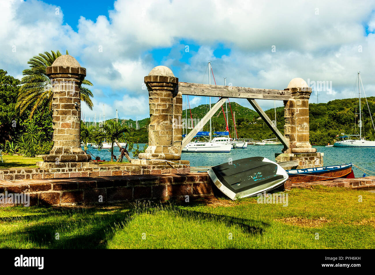 17th century sail loft pillars with a restored tie beam stand at the