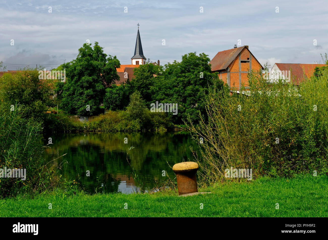 Trennfeld (part of Triefenstein): View with river Main and church St. Georg, Main-Spessart District, Lower Franconia, Bavaria, Germany Stock Photo