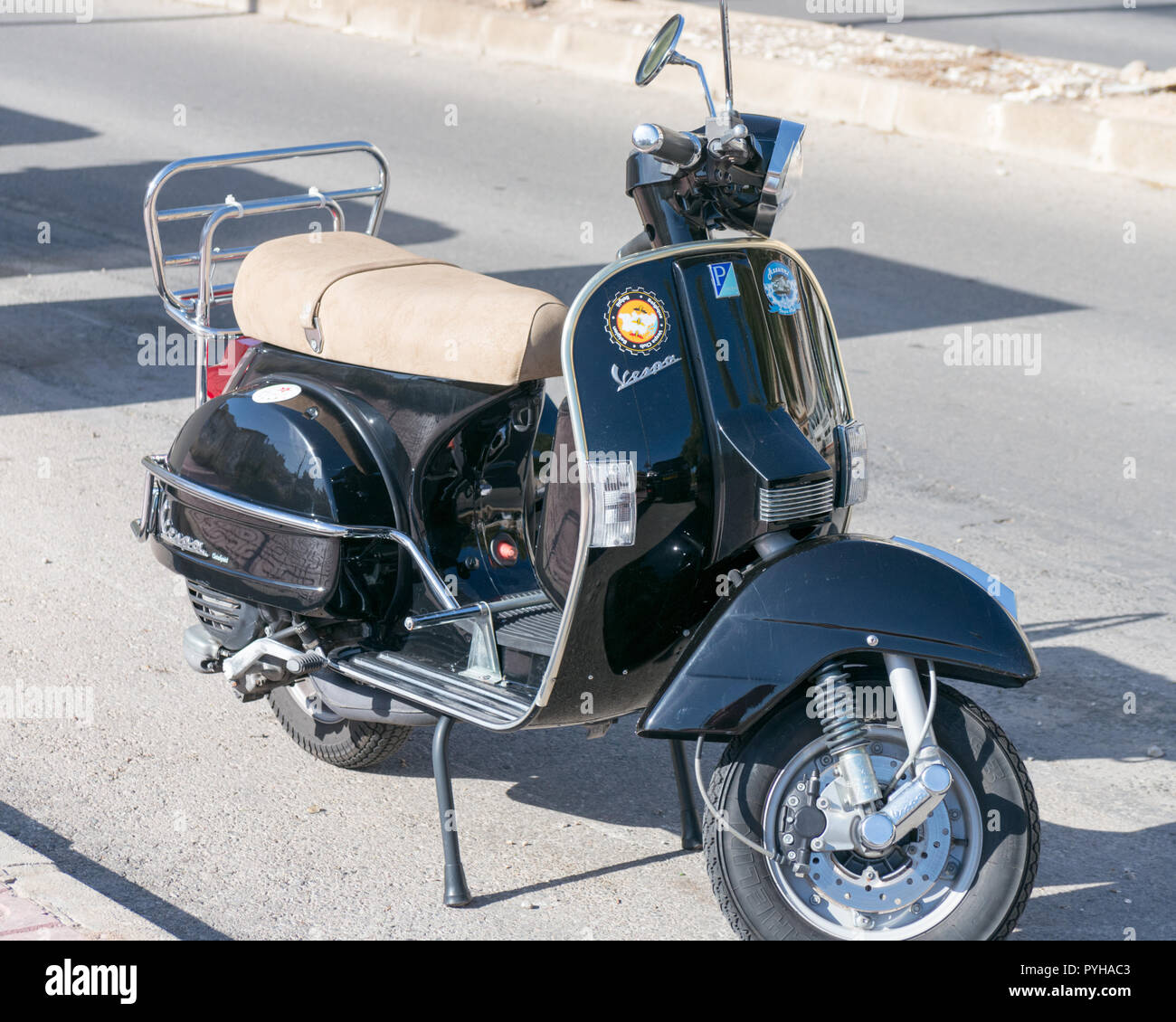 Vespa scooter in black Stock Photo - Alamy