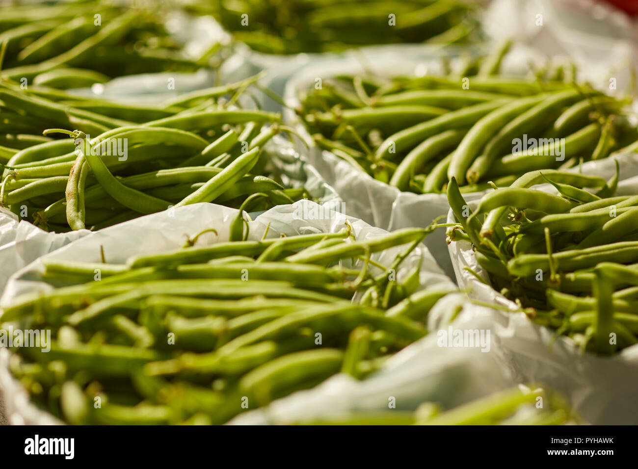 freshly picked string beans on display at a roadside farm stand in Amish Country, Lancaster County, Pennsylvania, USA Stock Photo