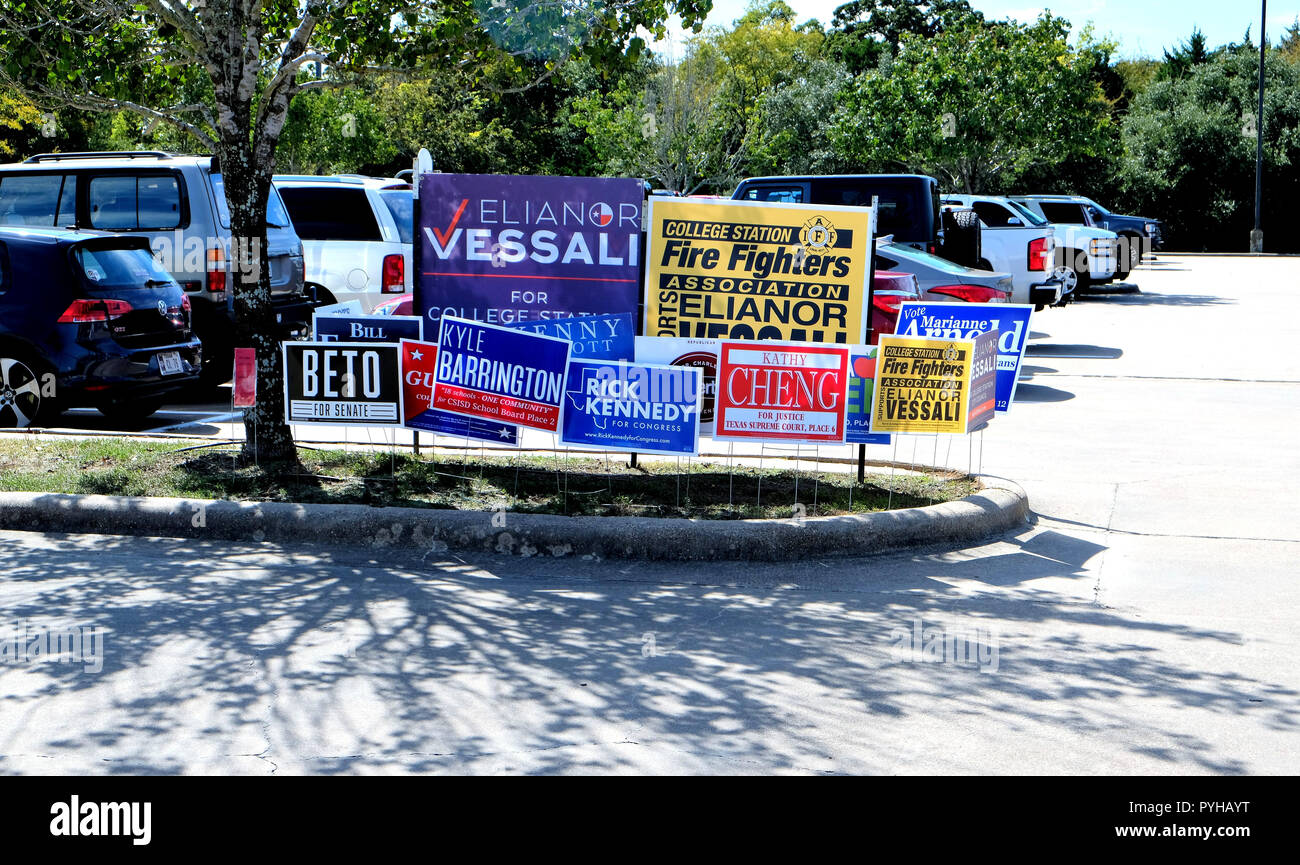 Campaign signs outside an early polling venue during the 2018 midterm elections in College Station, Texas, USA. Stock Photo