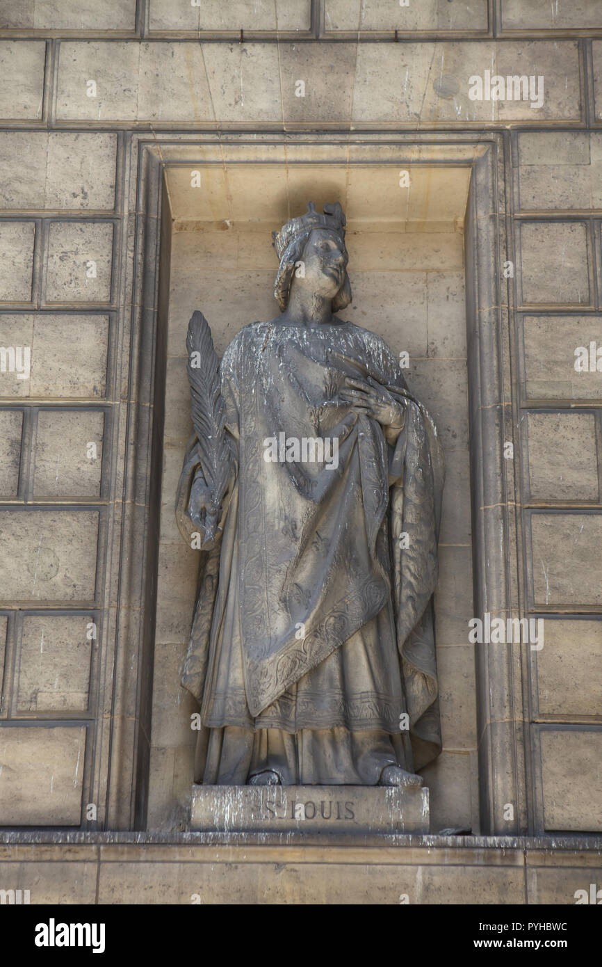 Statue of Saint Louis (King Louis IX of France) on the main facade of the Madeleine Church (Église de la Madeleine) in Paris, France. Stock Photo