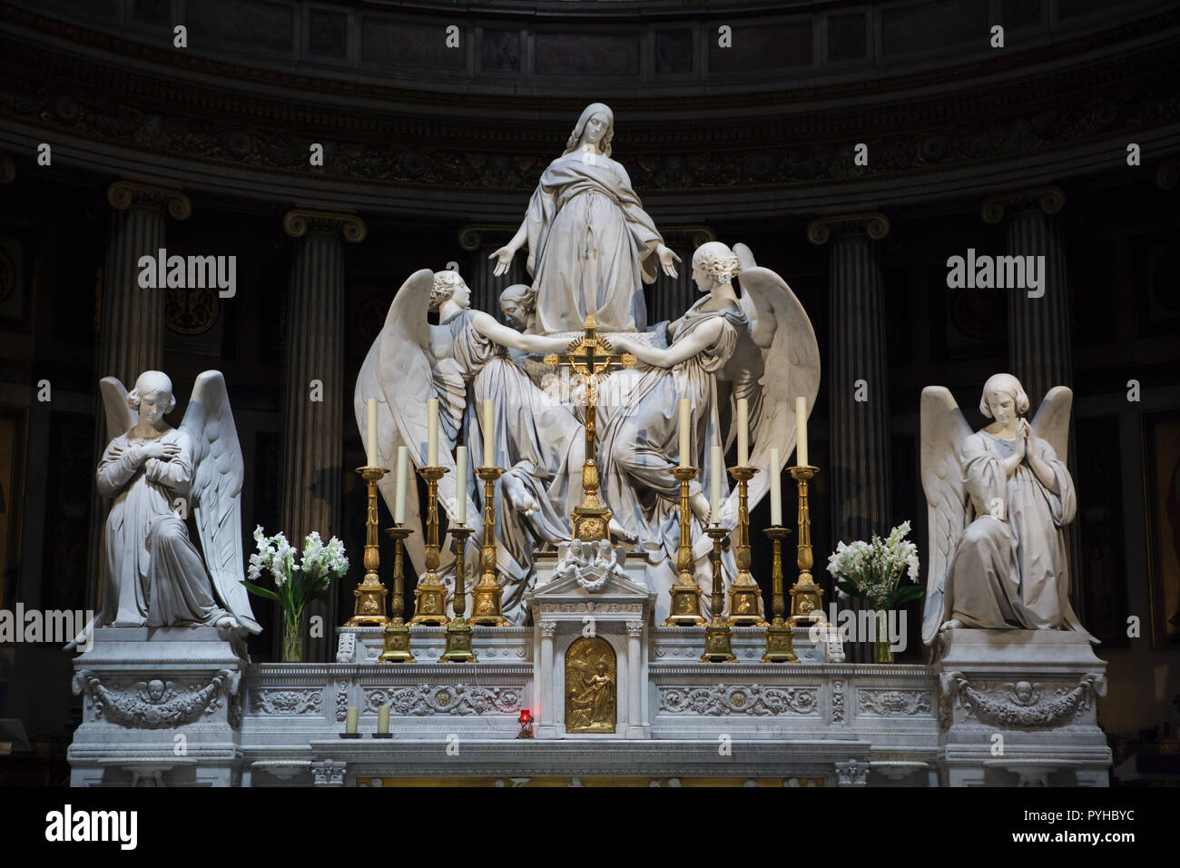 Assumption of Saint Mary Magdalene. Marble statue by French sculptor Carlo Marochetti on the high altar of the Madeleine Church (Église de la Madeleine) in Paris, France. Stock Photo