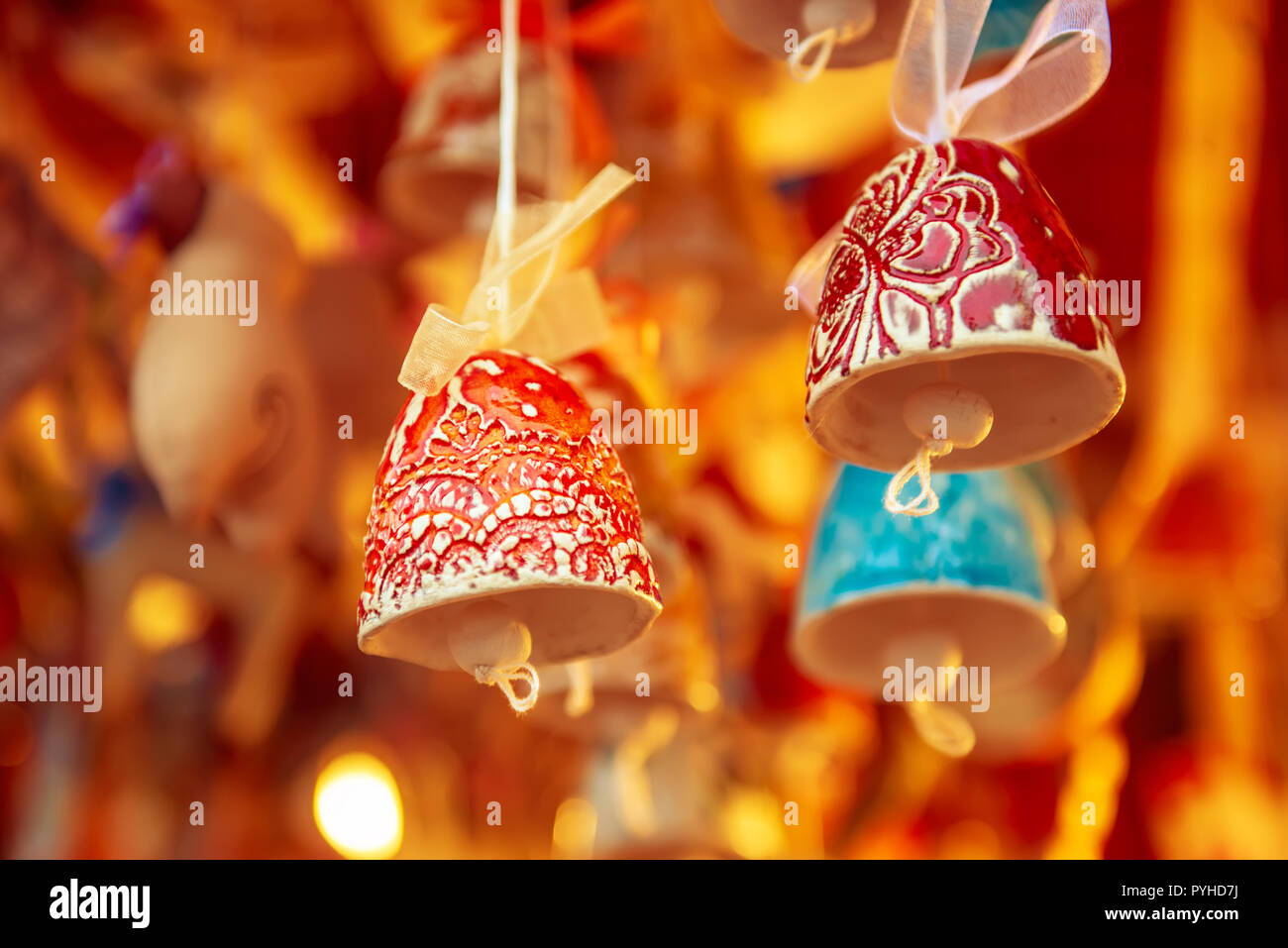 Souvenir bells at the market Stock Photo - Alamy