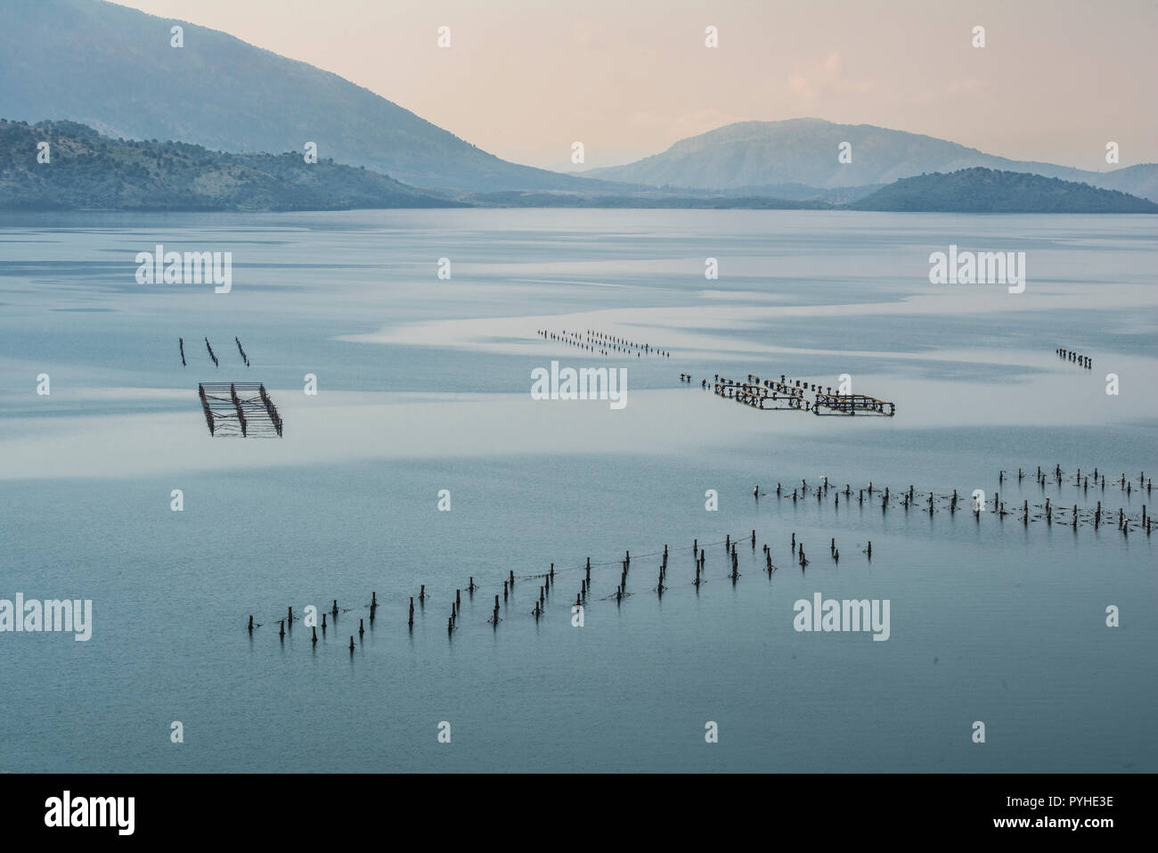 ALBANIA, structures of marine aquaculture creates a graphical pattern in the bay of Ksamil Stock Photo