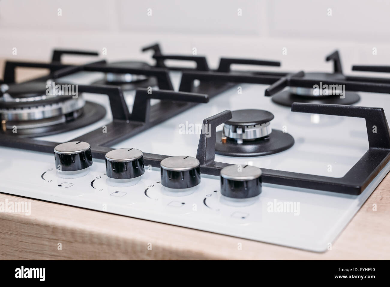 Gas control panel hob in kitchen close up Stock Photo
