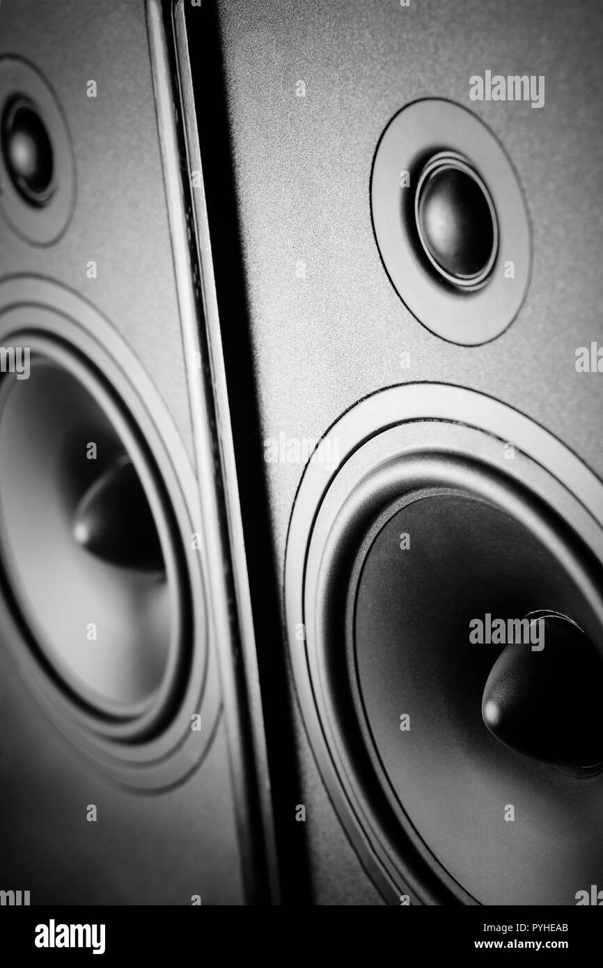 Close up of two audio sound speakers on dark background Stock Photo