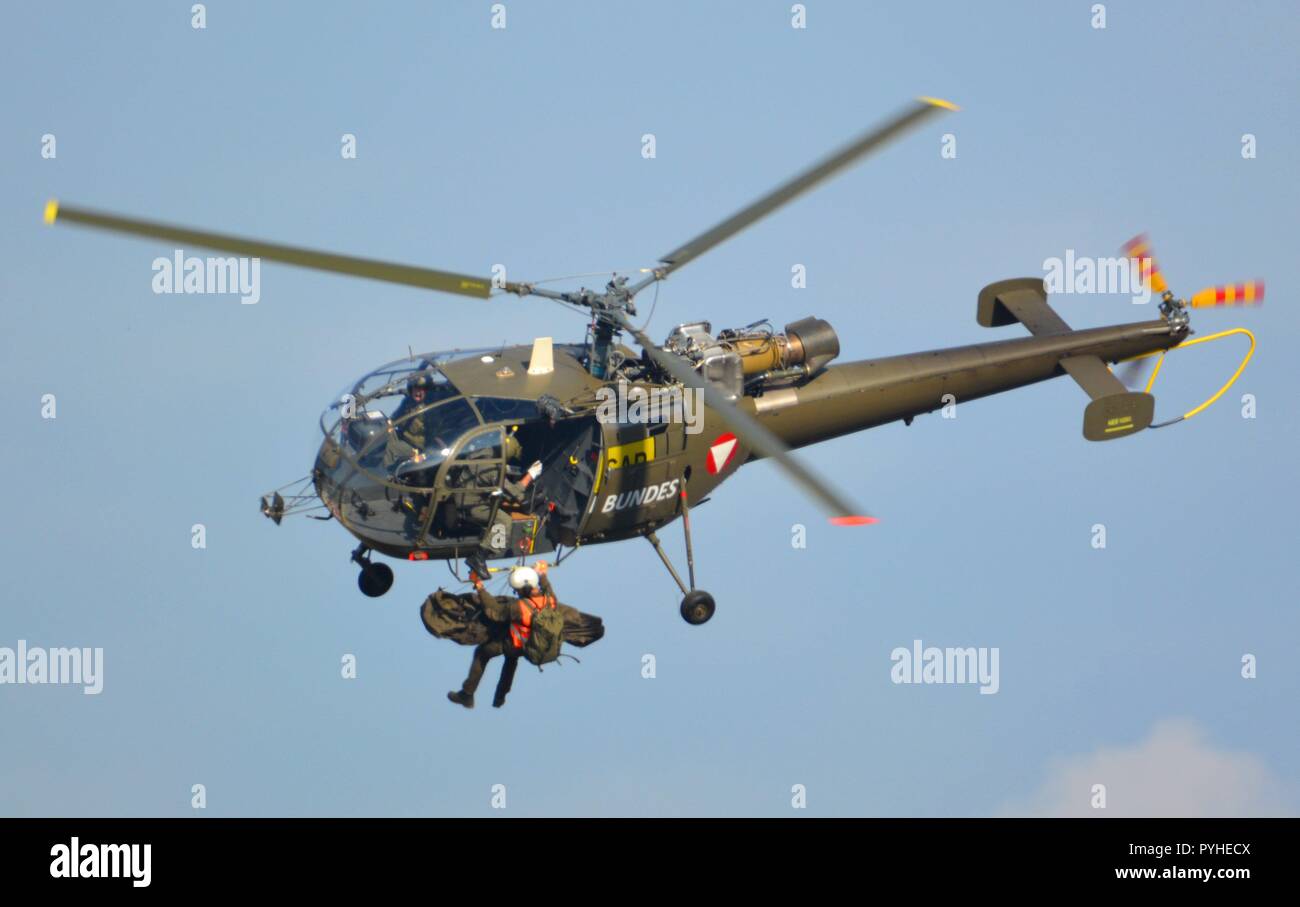 Close up of an Alouette III of the austrian air force during a recovery display on the 26th of October 2018 ( Nationalfeiertag) with rescuer on a rope Stock Photo