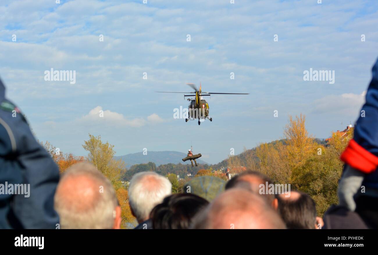 An Alouette III of the austrian air force during a recovery display on the 26th of October 2018 ( Nationalfeiertag) from a bridge with people Stock Photo