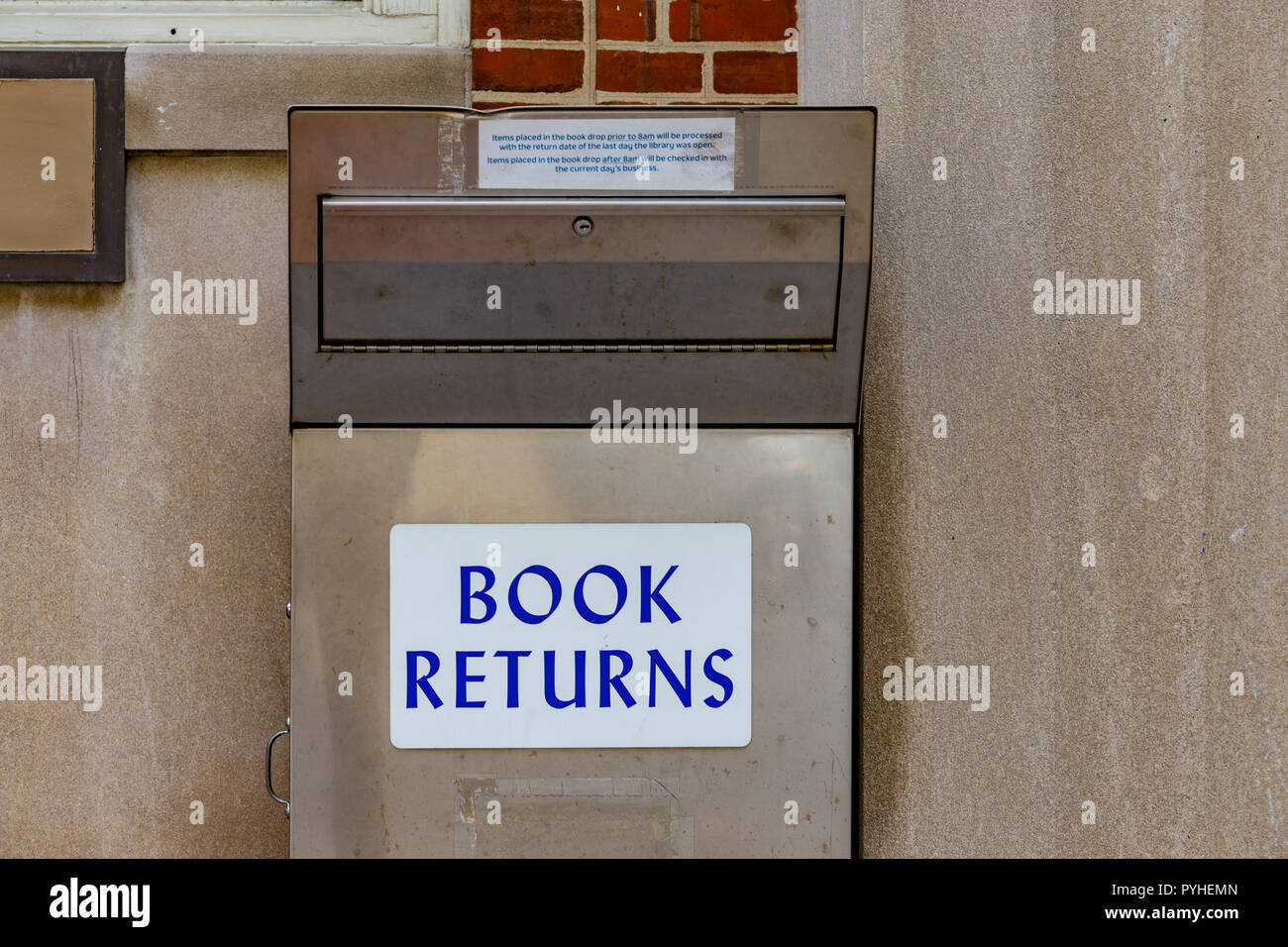 Lancaster, PA, USA - May 5, 2018: The Book Return Box at the Public Library in Lancaster, Pennsylvania. Stock Photo