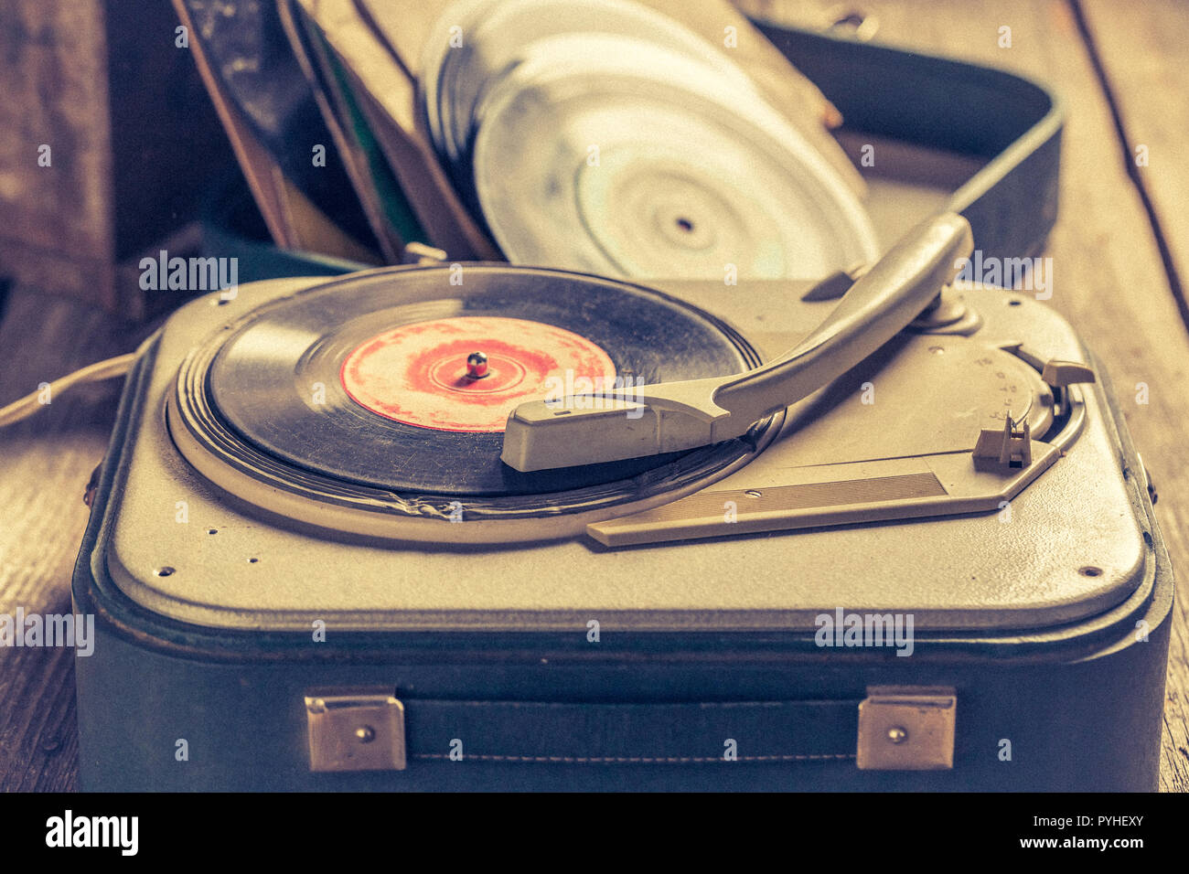 Old record player and few vinyl records Stock Photo - Alamy
