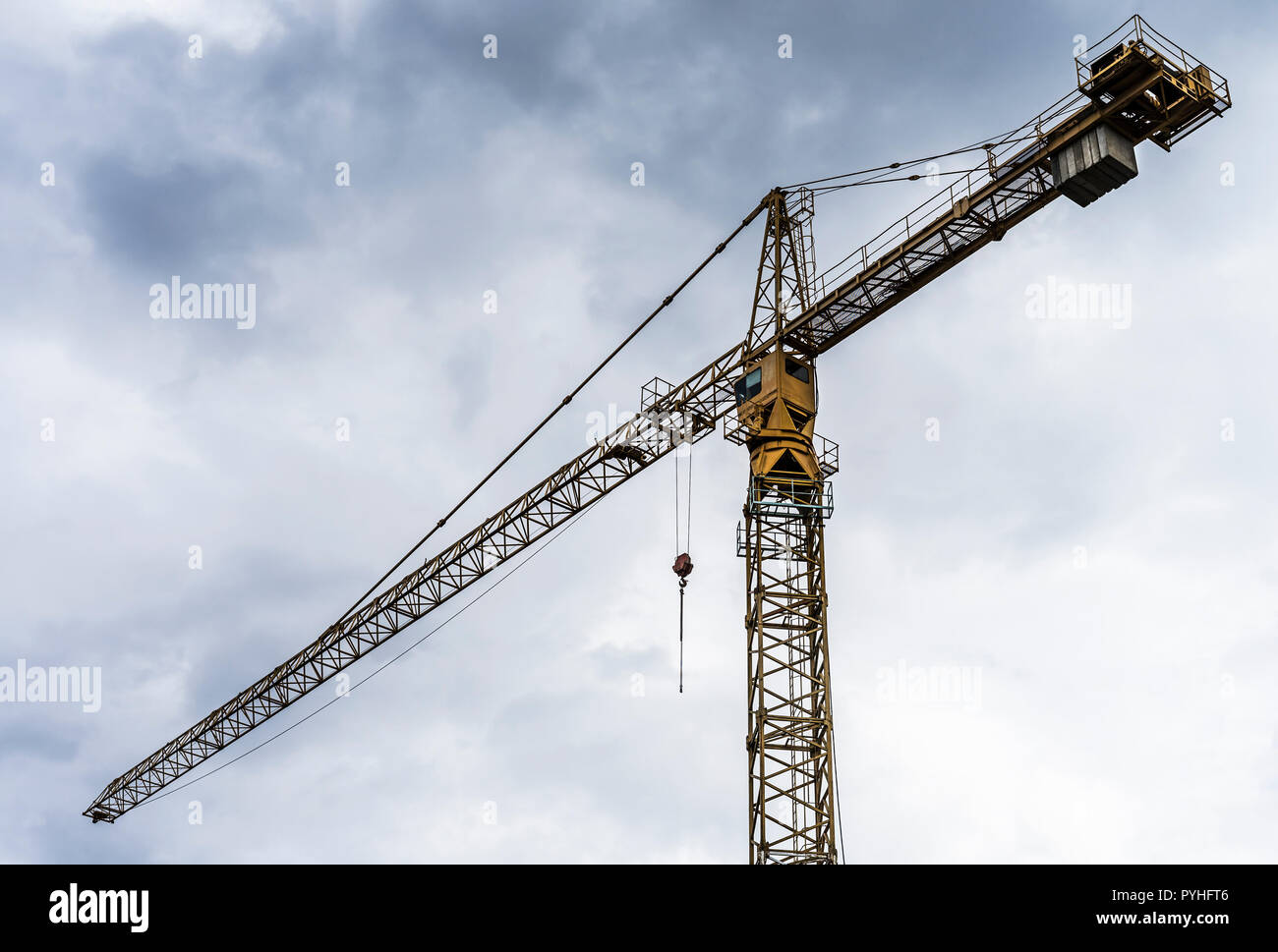 Construction crane is ready for lifting heavy objects Stock Photo - Alamy