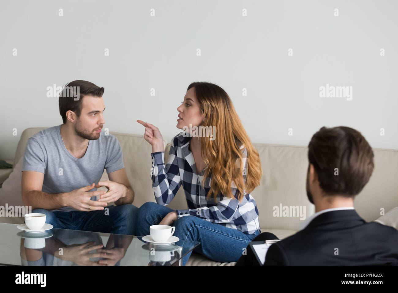 Annoyed nervous wife accusing, blaming her husband Stock Photo Alamy