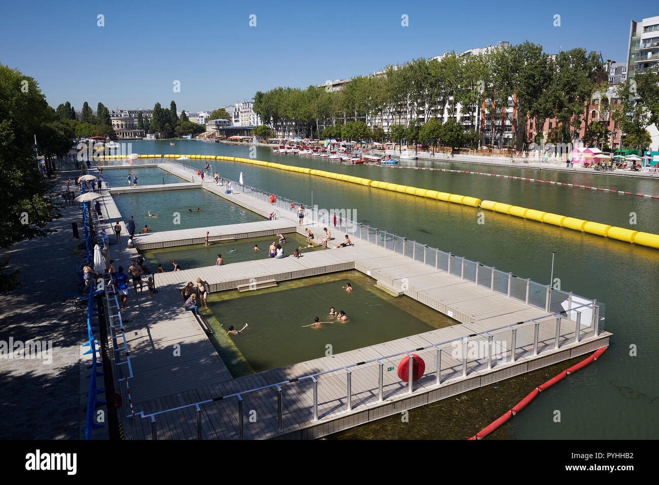 Paris, Ile-de-France, France - The summer river swimming pool in the Bassin de La Villette. Stock Photo