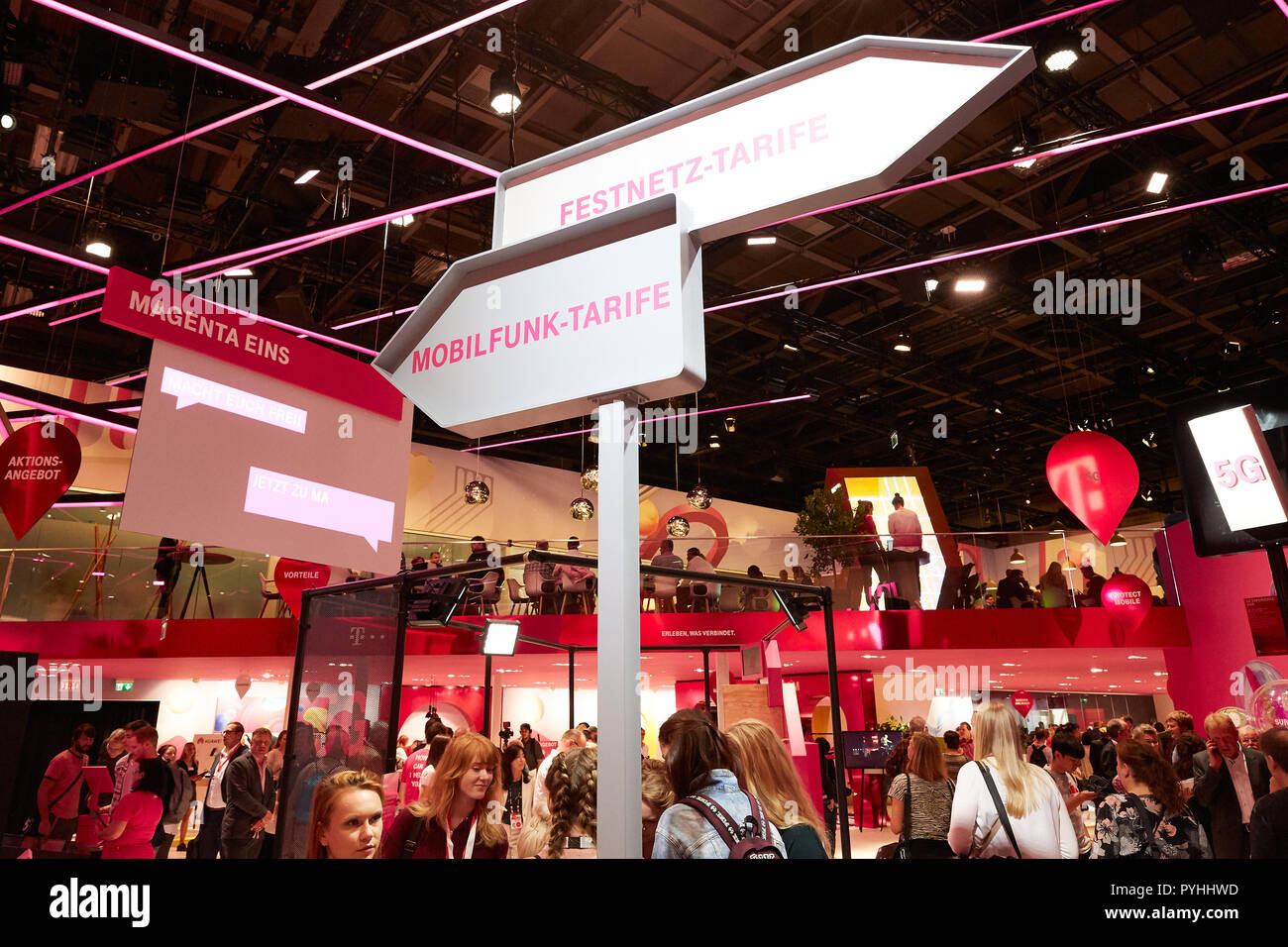 Berlin, Germany - Two information signs at Deutsche Telekom's booth at IFA 2018 with information on fixed and mobile rates. Stock Photo