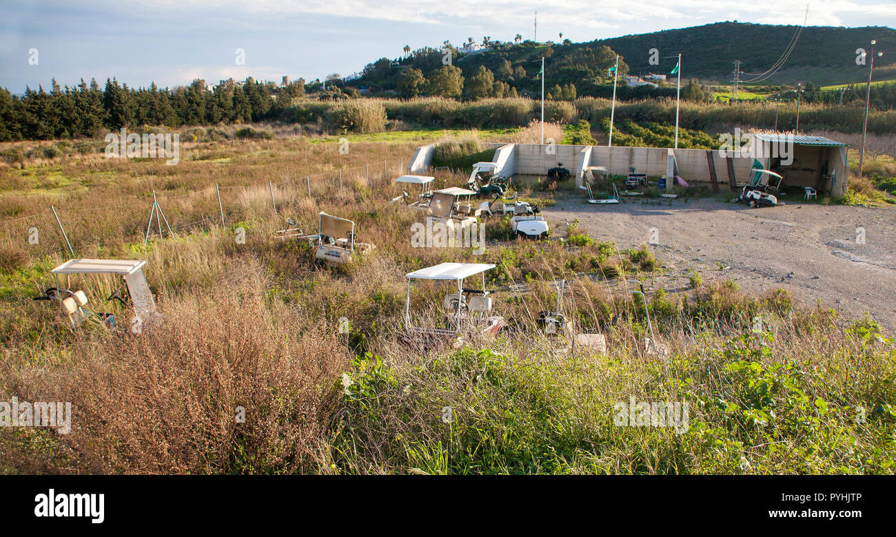 Golf cart graveyard for golf buggies Stock Photo Alamy