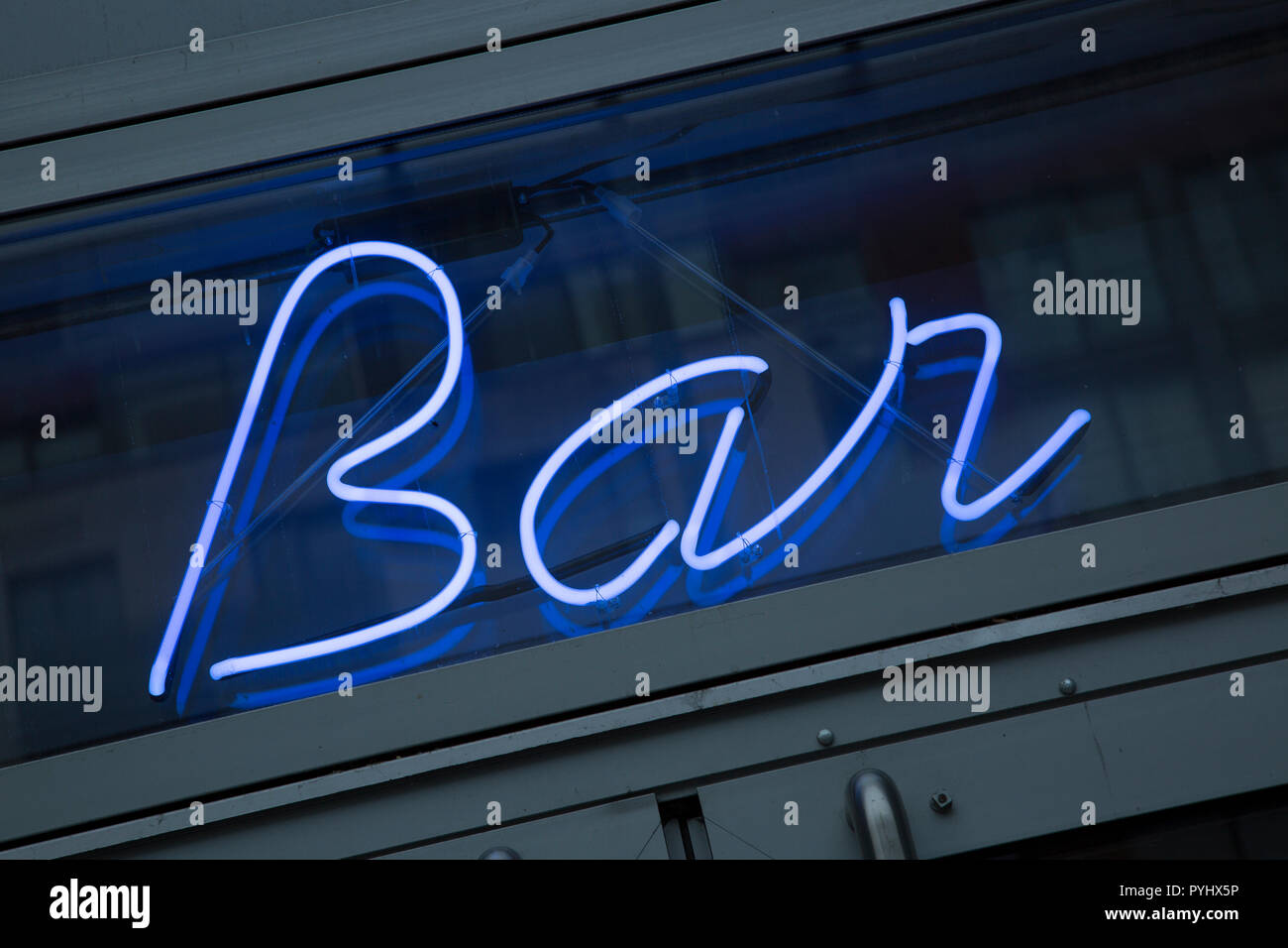 Illuminated Bar Sign at Night Stock Photo - Alamy