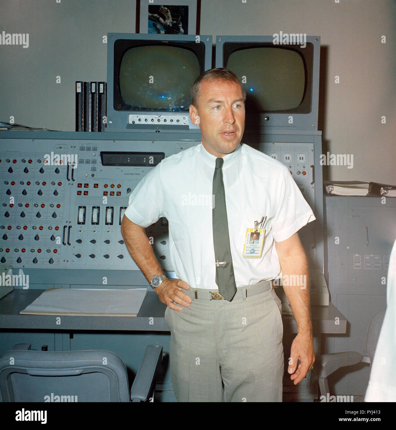 (6 Sept. 1966) --- Astronaut James A. Lovell Jr., prime crew command pilot for the Gemini-12 spaceflight, is pictured in Building 5, Mission Simulation and Training Facility, prior to entering the Gemini Mission Simulator for flight training. Stock Photo