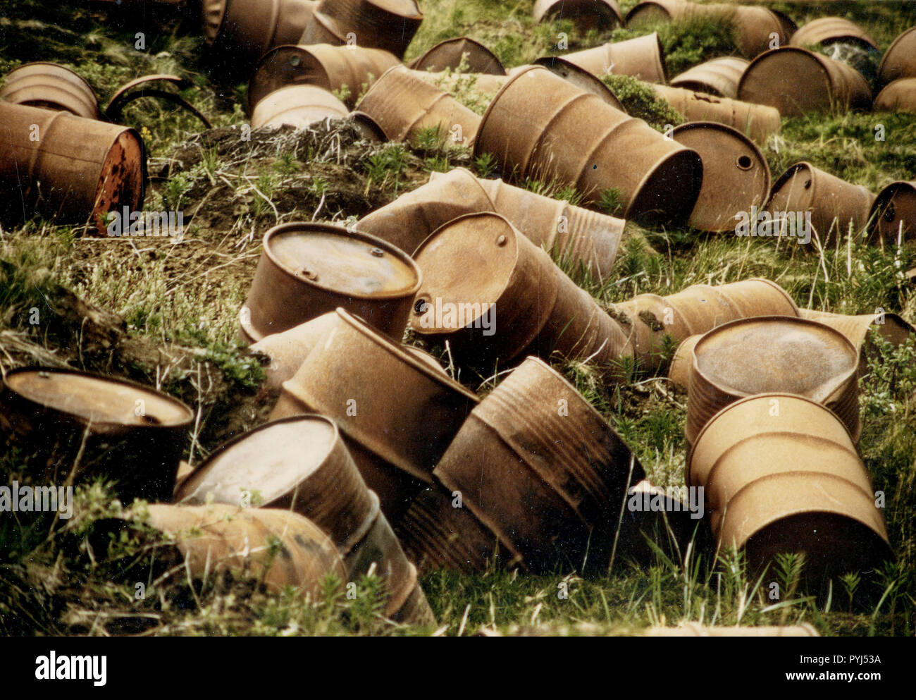 7/7/1973 - WW II trash (metal barrels) In Port Heiden Stock Photo