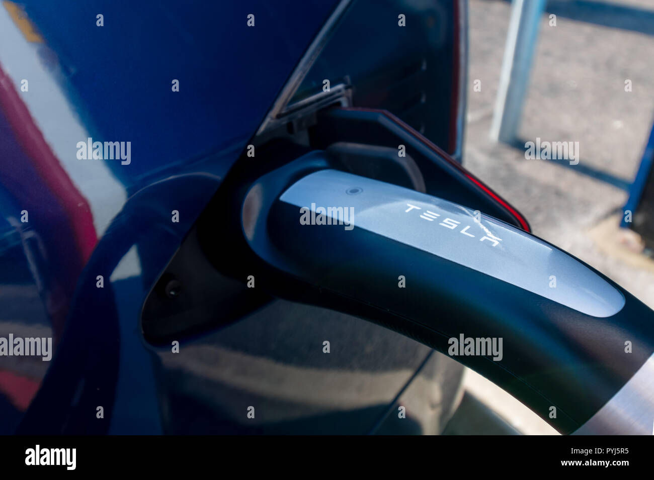 Close up of a Tesla electric car charging Stock Photo