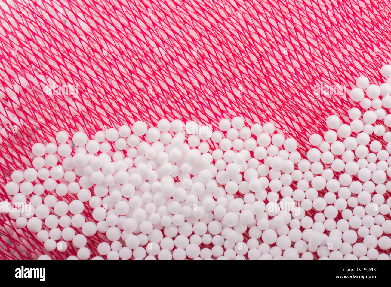White little polystyrene foam balls as background Stock Photo