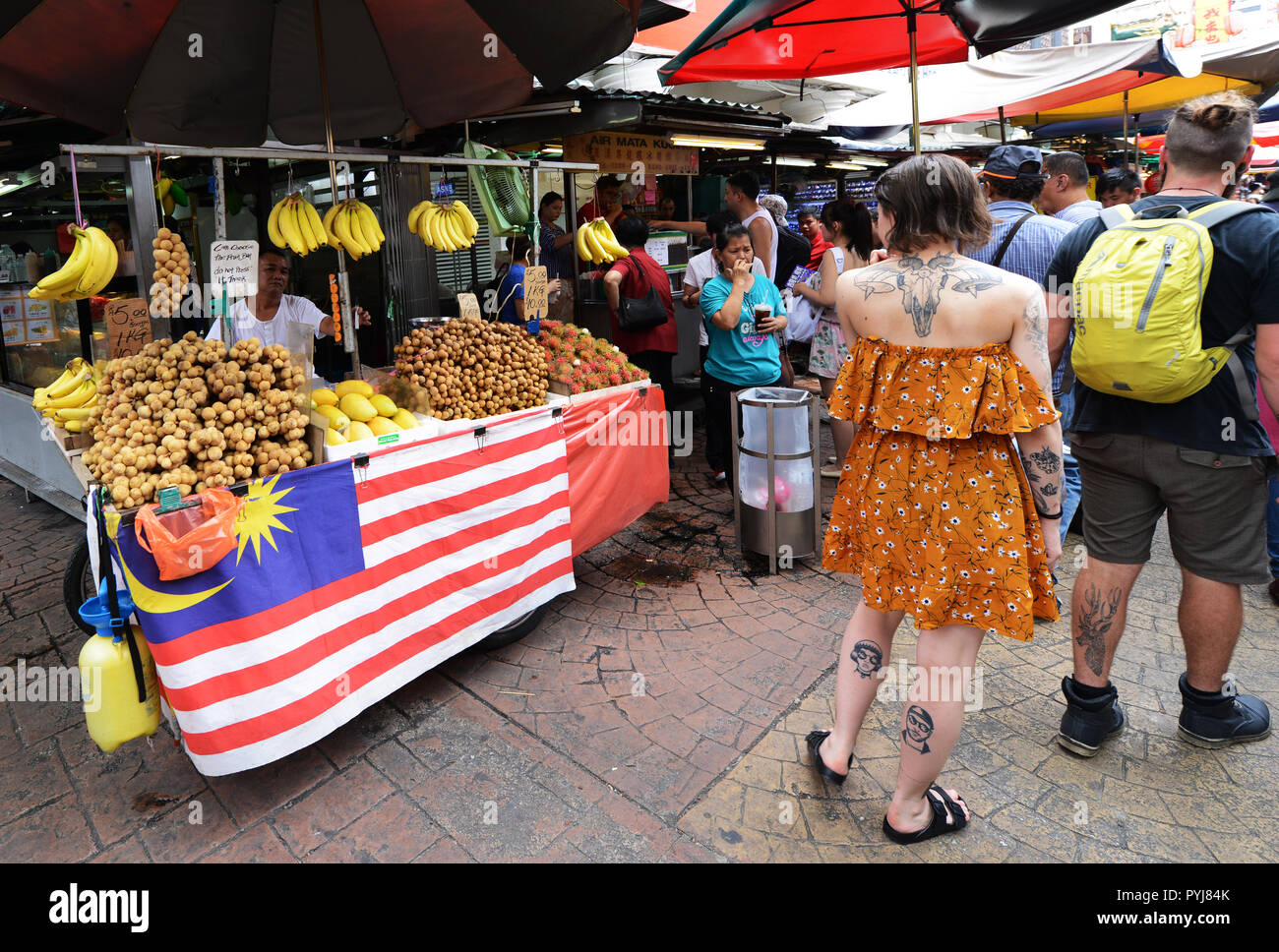 A Longan fruit vendor at the market in KL, Malaysia. Stock Photo