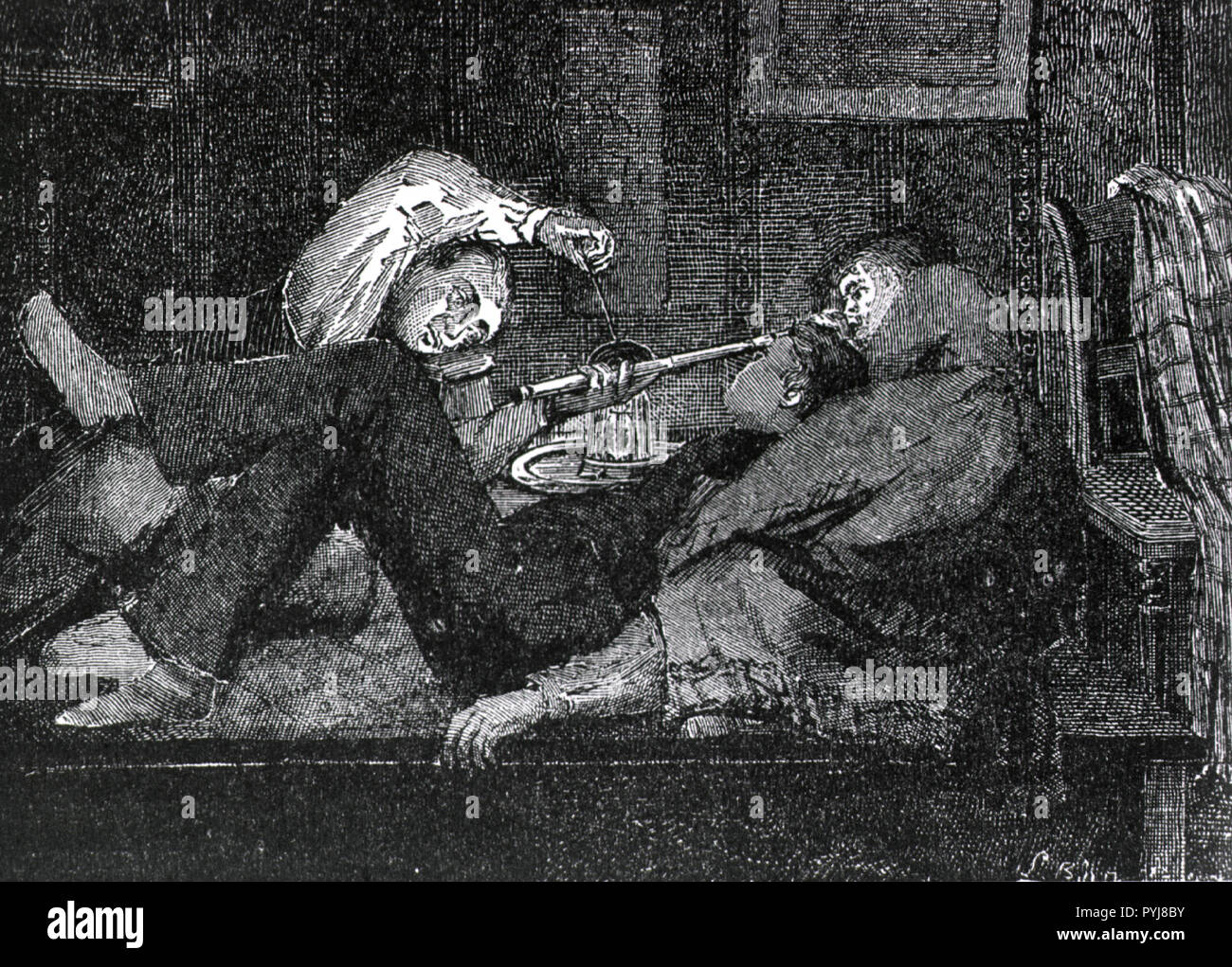 Two men and a woman are in reclining positions smoking opium; one man is leaning against the woman who is lying perpendicular to him, the other man is manipulating the bowl of the pipe over a flame Stock Photo