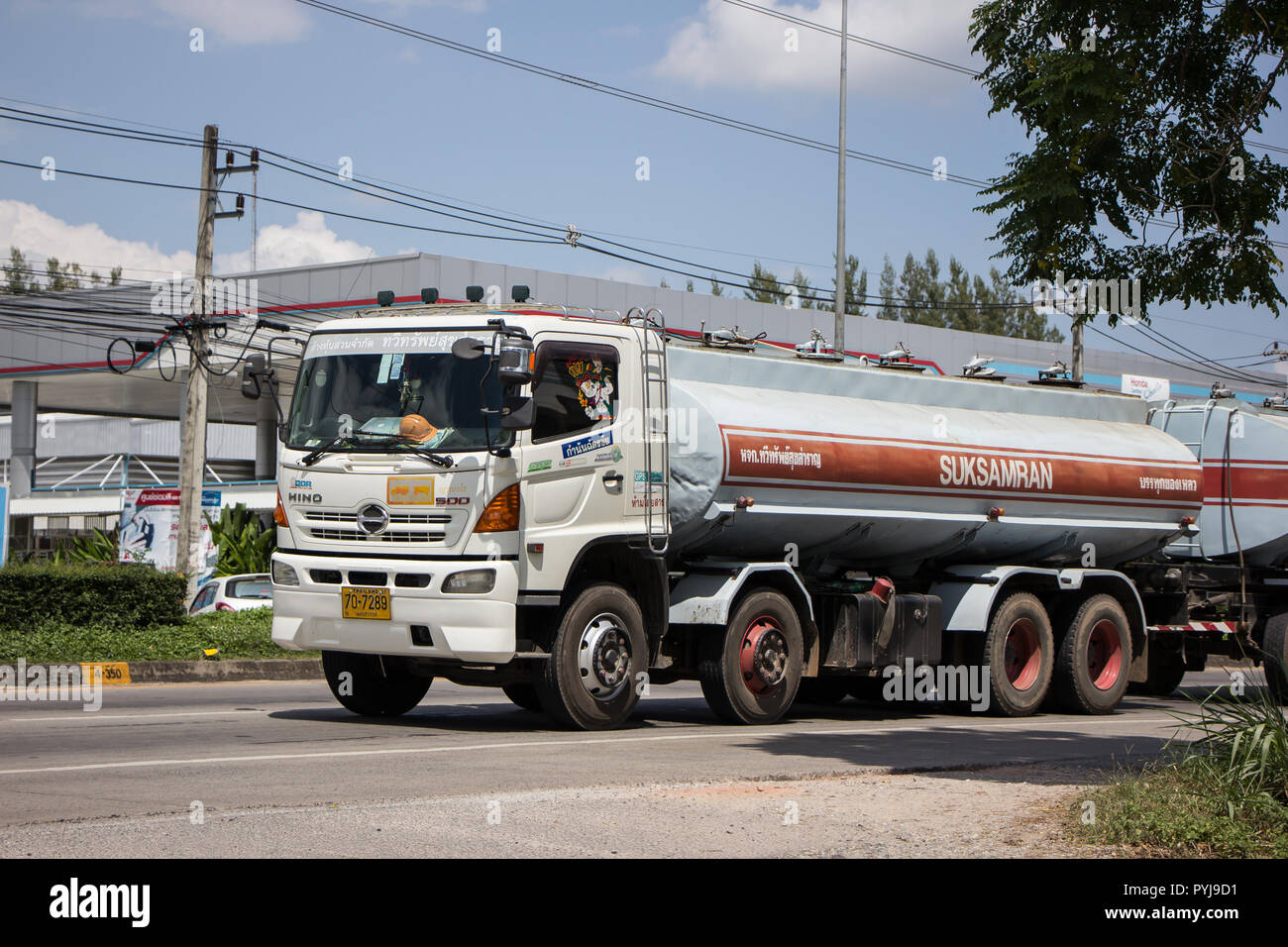 Chiangmai, Thailand - September 25 2018: Trailer Truck and Palm Oil Tank Truck of Suksamran Transport. Photo at road no 121 about 8 km from downtown C Stock Photo