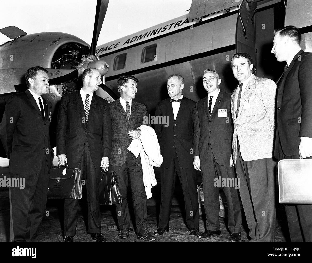 This photograph was taken in September 1962 during one such visit. From left to right are Elliot See, Tom Stafford, Wally Schirra, John Glenn, Brainerd Holmes, Dr. von Braun, and Jim Lovell. Stock Photo