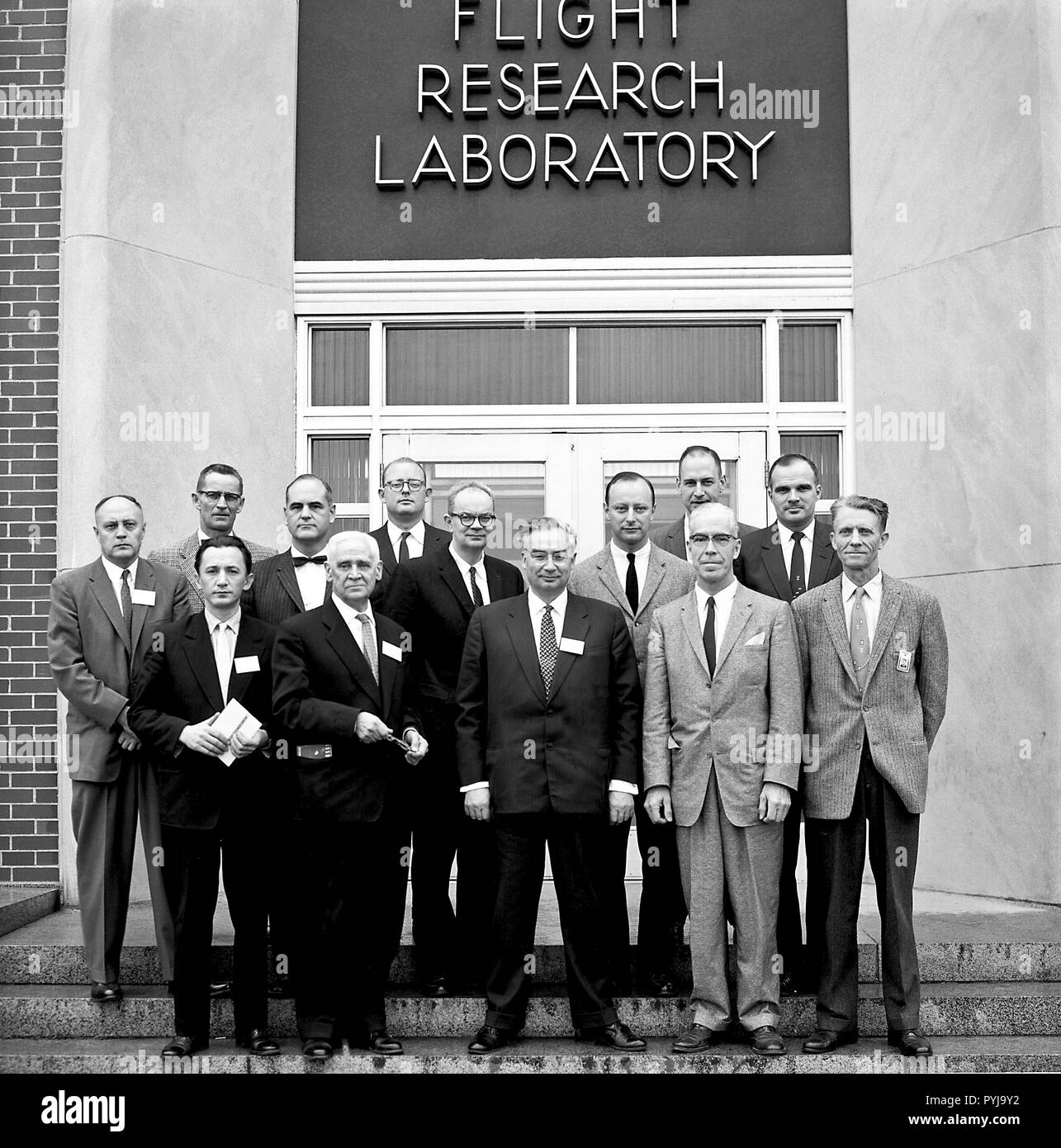 Russian Scientists from the Commission of Interplanetary Travel of the Soviet Academy of Science November 21,1959  Left to right: Front row: Yury S. Galkin, Anatoly A. Blagonravov, and Prof. Leonid I. Sedov (Chair of the Commission for Interplanetary Travel)-Soviet Academy of Science, Leninski Gory, Moscow, Russia  Dr. H.J. E. Reid and Floyd L. Thompson Langley Research Center. Second row: Boris Kit Translator, Library of Congress, Washington, D.C.  Eugene C. Draley and Laurence K. Loftin, Jr. -Langley Research Center  Arnold W. Frutkin and Harold R. Lawrence NASA Headquarters.  Back row: T.Me Stock Photo