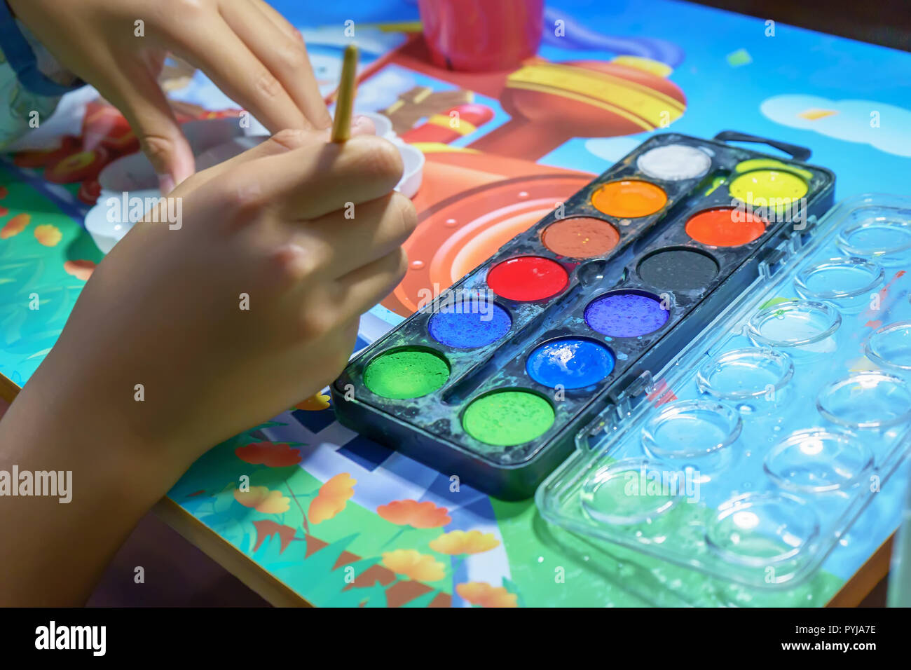The children are learning to mix colors. It is homework Stock Photo - Alamy