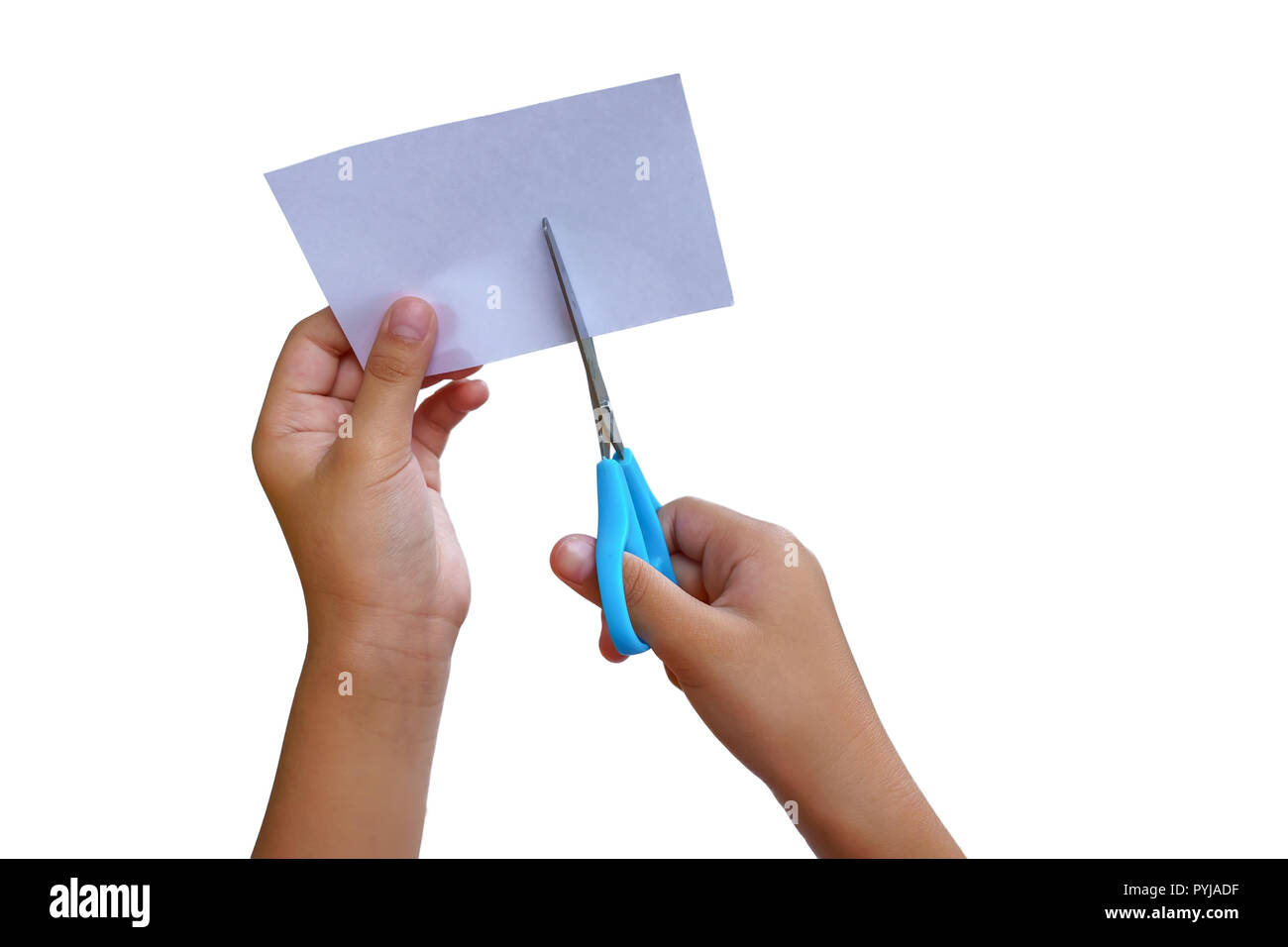 A girl is using scissors of paper cutting on a white backgrounds Stock