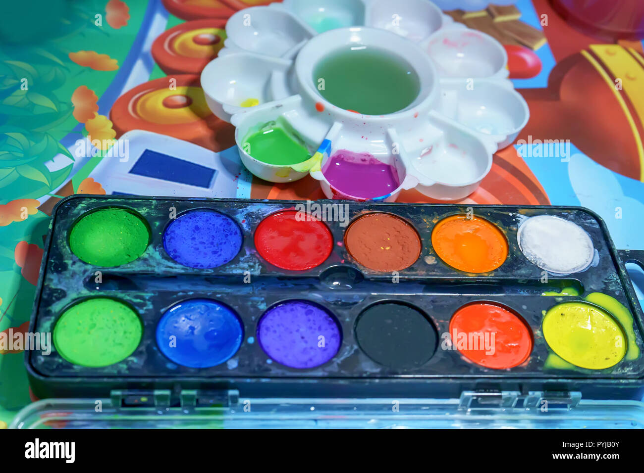 The children are learning to mix colors. It is homework Stock Photo - Alamy