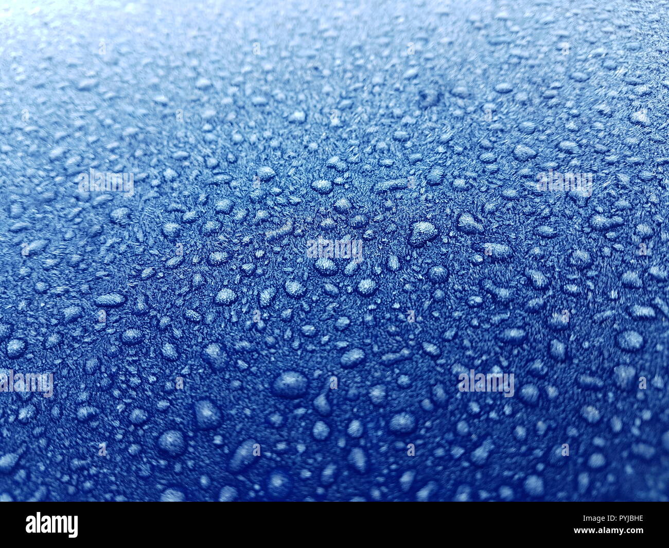 Frozen Water Droplets on a Frosted Metallic Background Stock Photo - Alamy