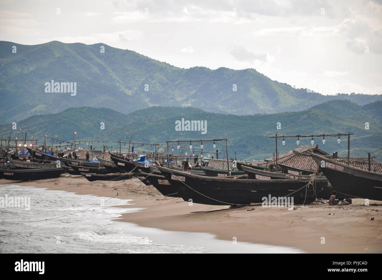 Rare picture of North-Koreas state controlled local fishing fleet close to the city of Hamhung Stock Photo