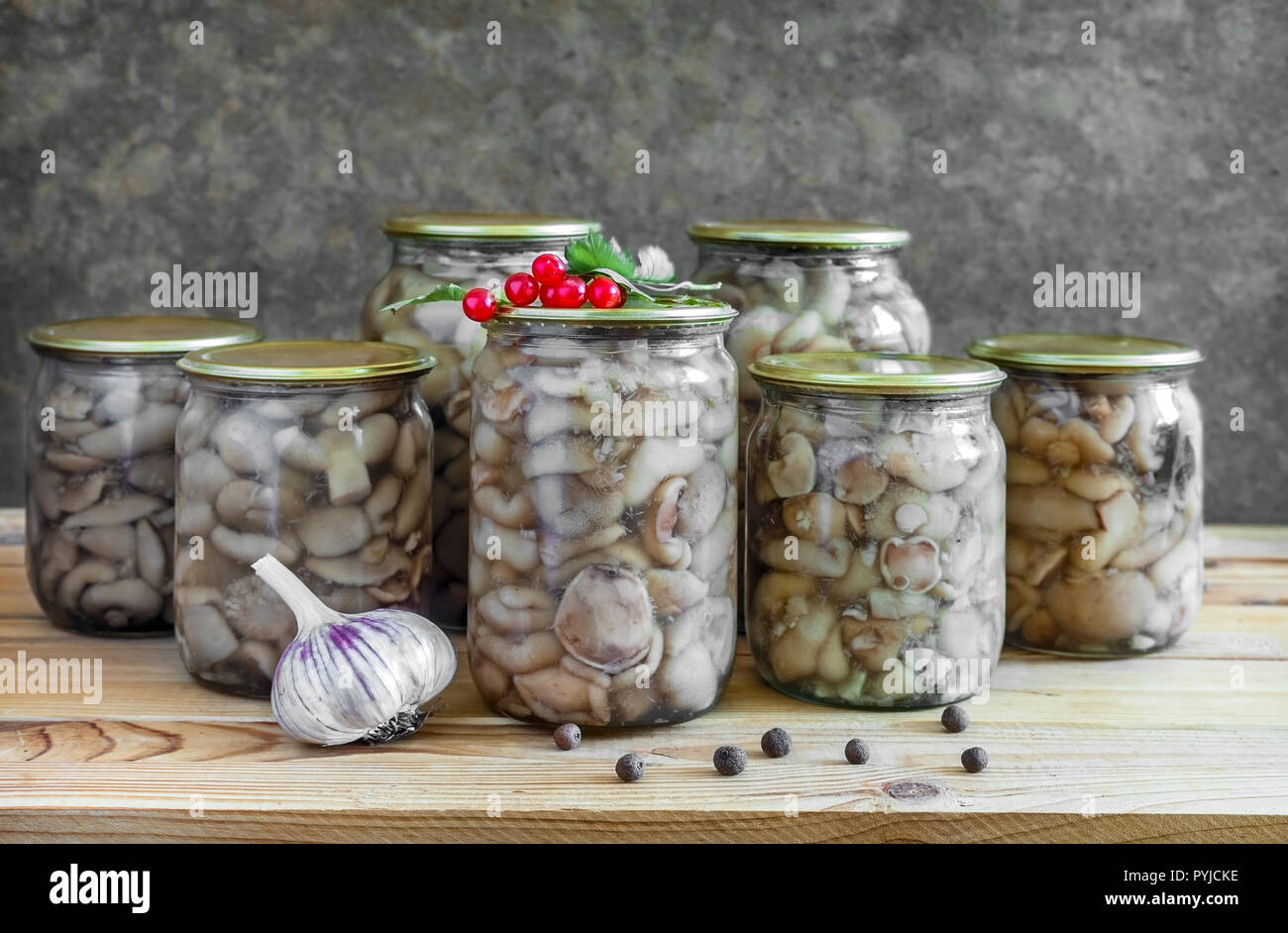 Home canning pickled mushrooms in glass jars Stock Photo Alamy