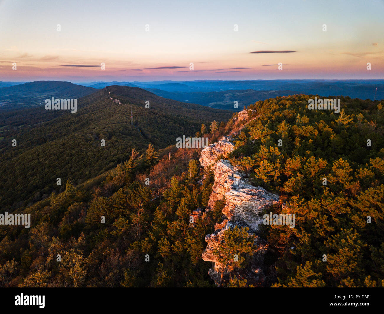 Aerial view of the southern ridge line quartzite rock of North Fork Mountain at sunset high above Germany Valley to the west and and the Shenandoah Va Stock Photo