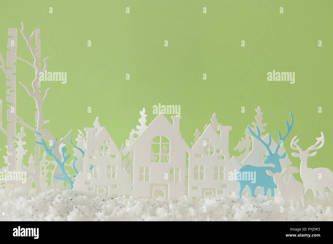 Magical Christmas paper cut winter background landscape with houses ...