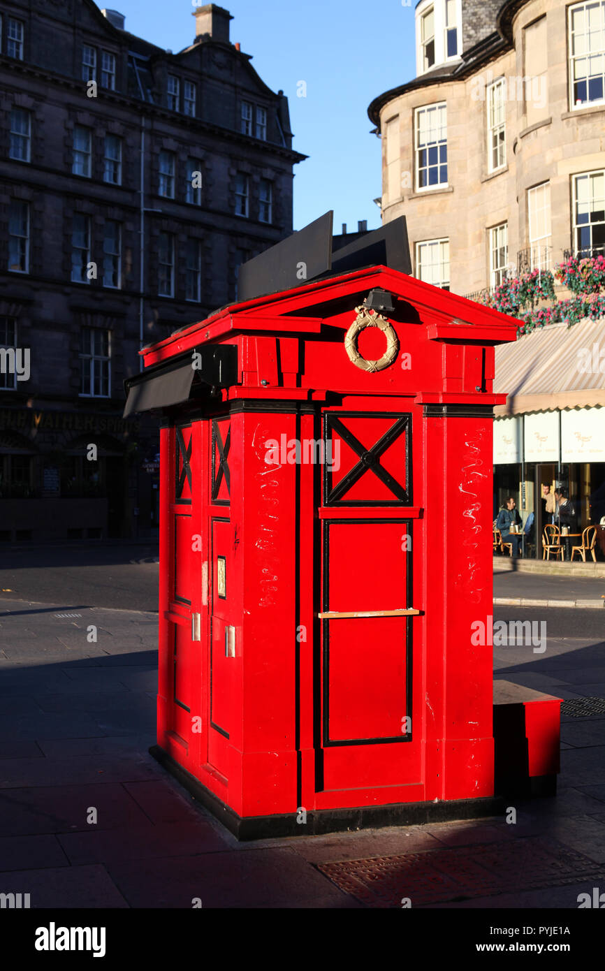 A brightly painted red police phone box situated in shandwick place in Edinburgh Stock Photo