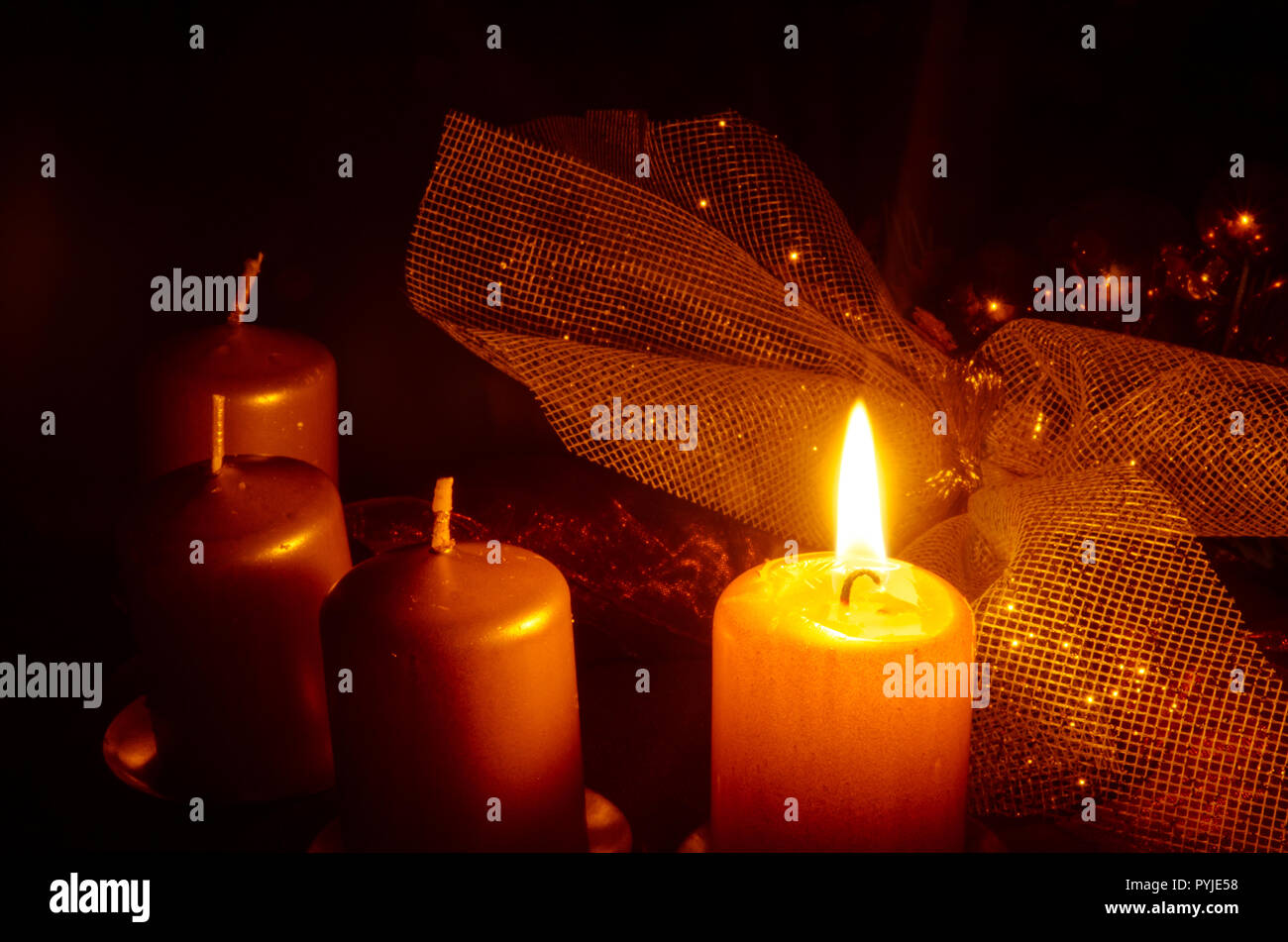 one burning candle in advent wreath Stock Photo Alamy