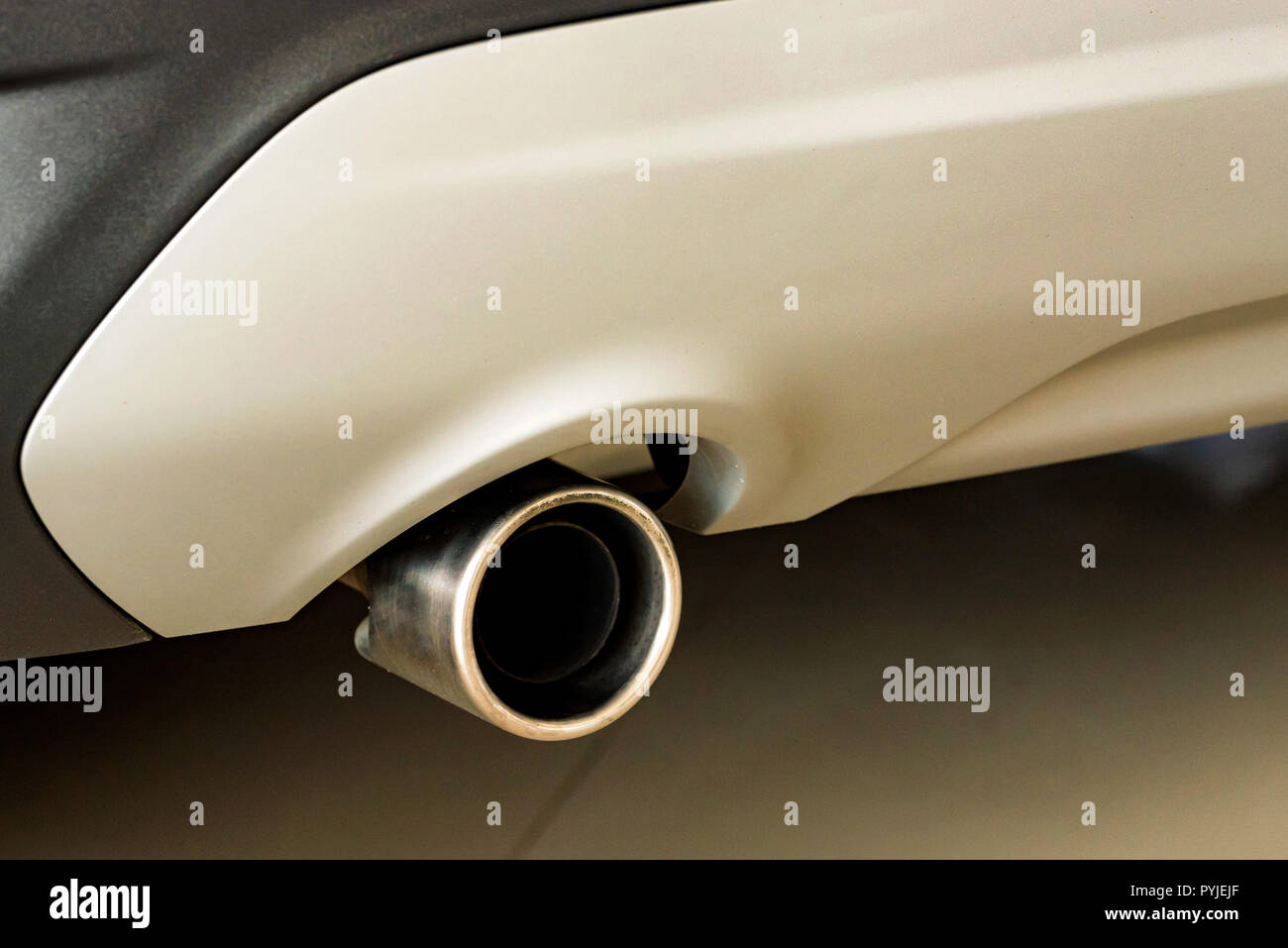 Exhaust pipe of a modern white car Stock Photo