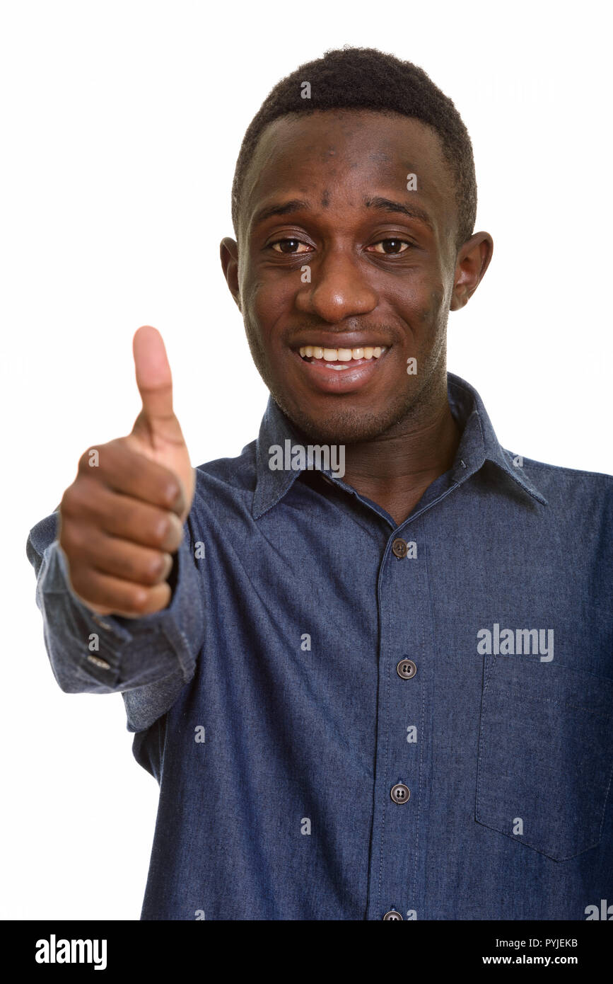 Young happy African man smiling and giving thumb up Stock Photo - Alamy