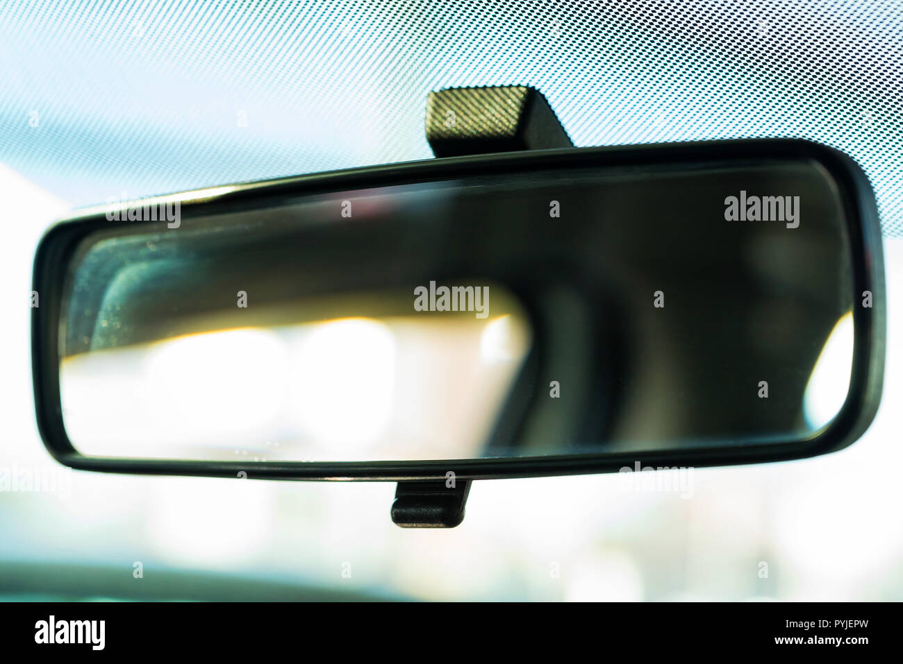 Adjusting the rear view mirror of a car hi-res stock photography and ...