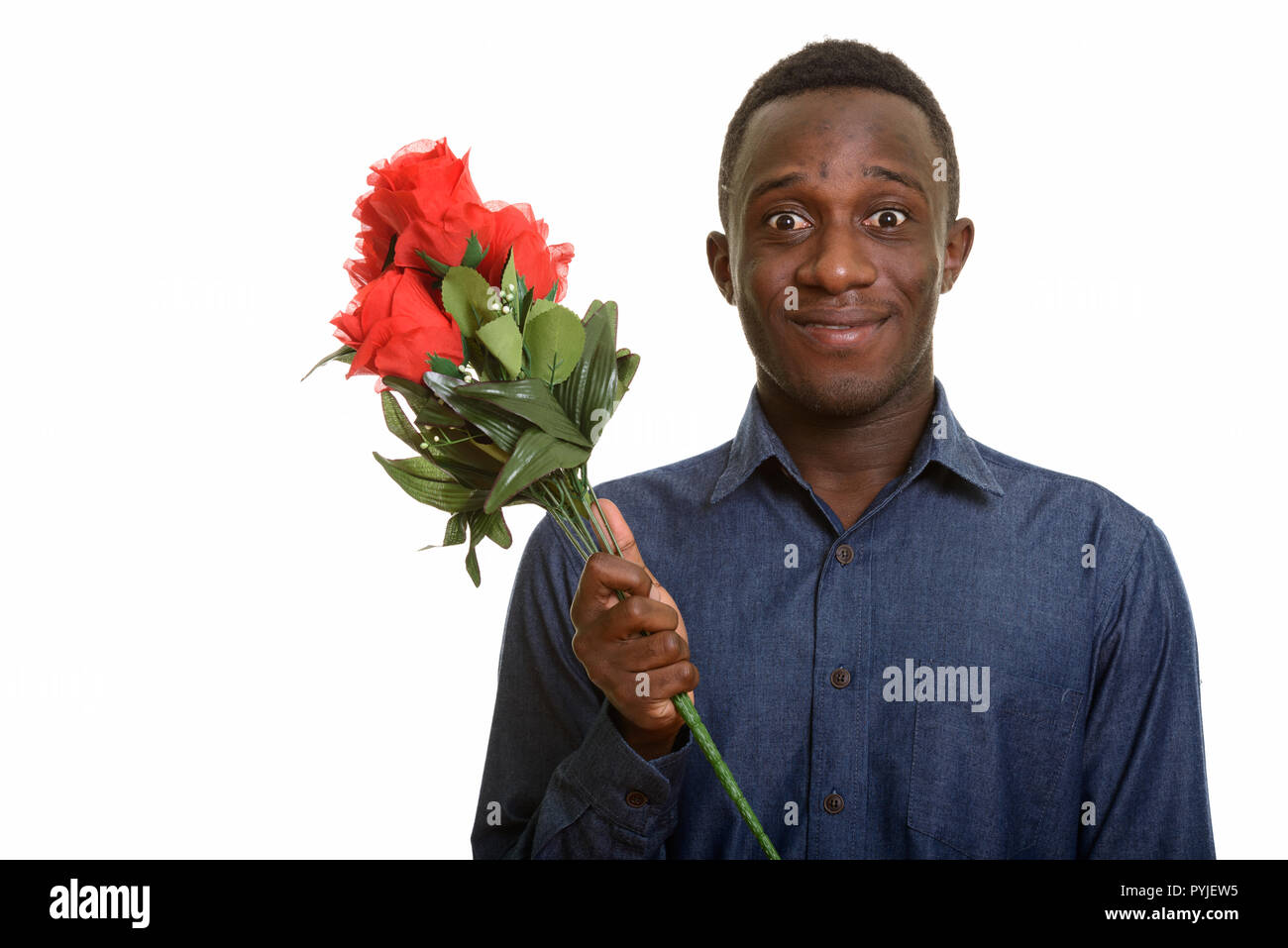 Excited african man smiling hi-res stock photography and images - Alamy