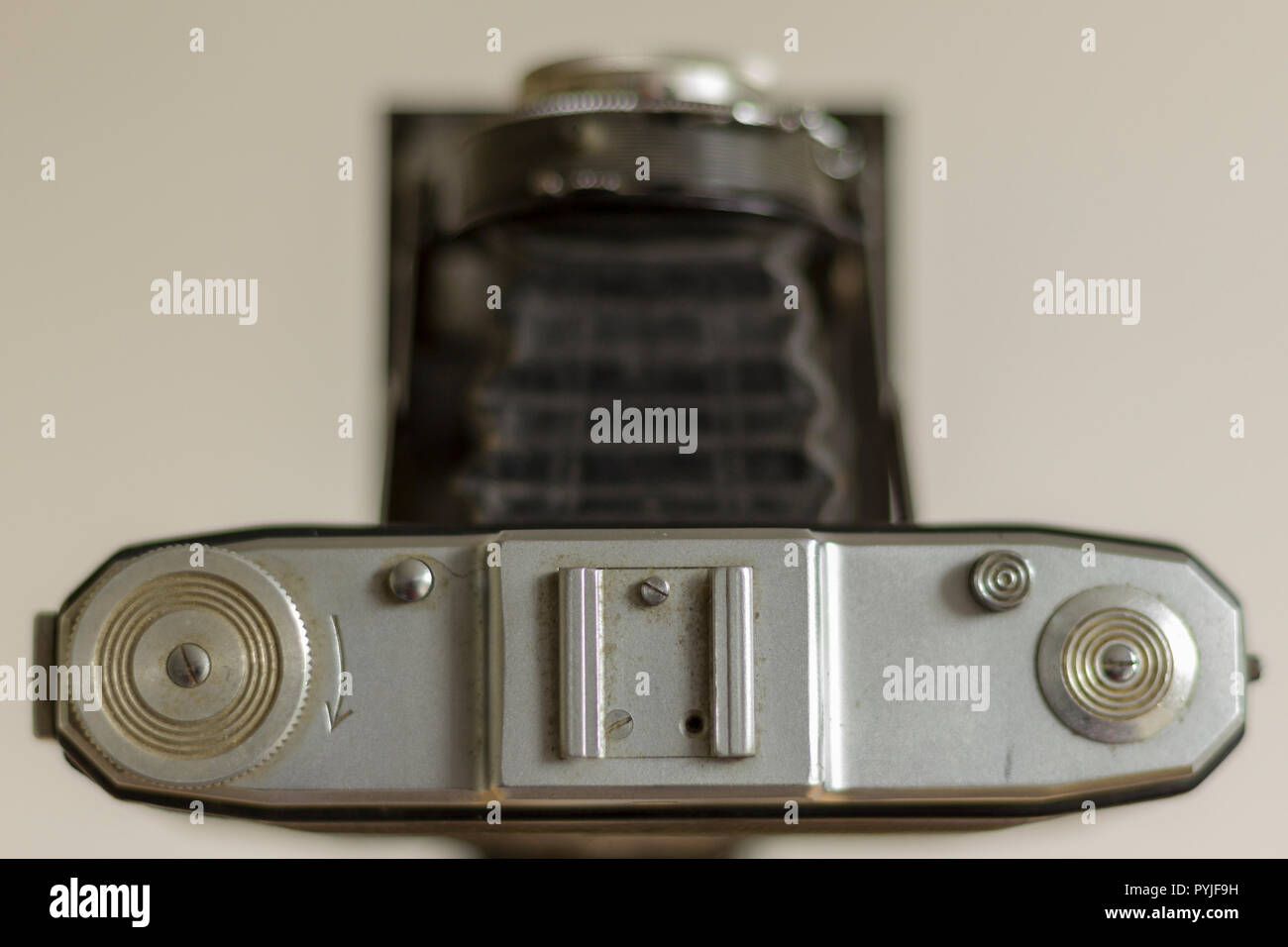 Overhead view of 120mm film camera with a folding bellows lens (out of